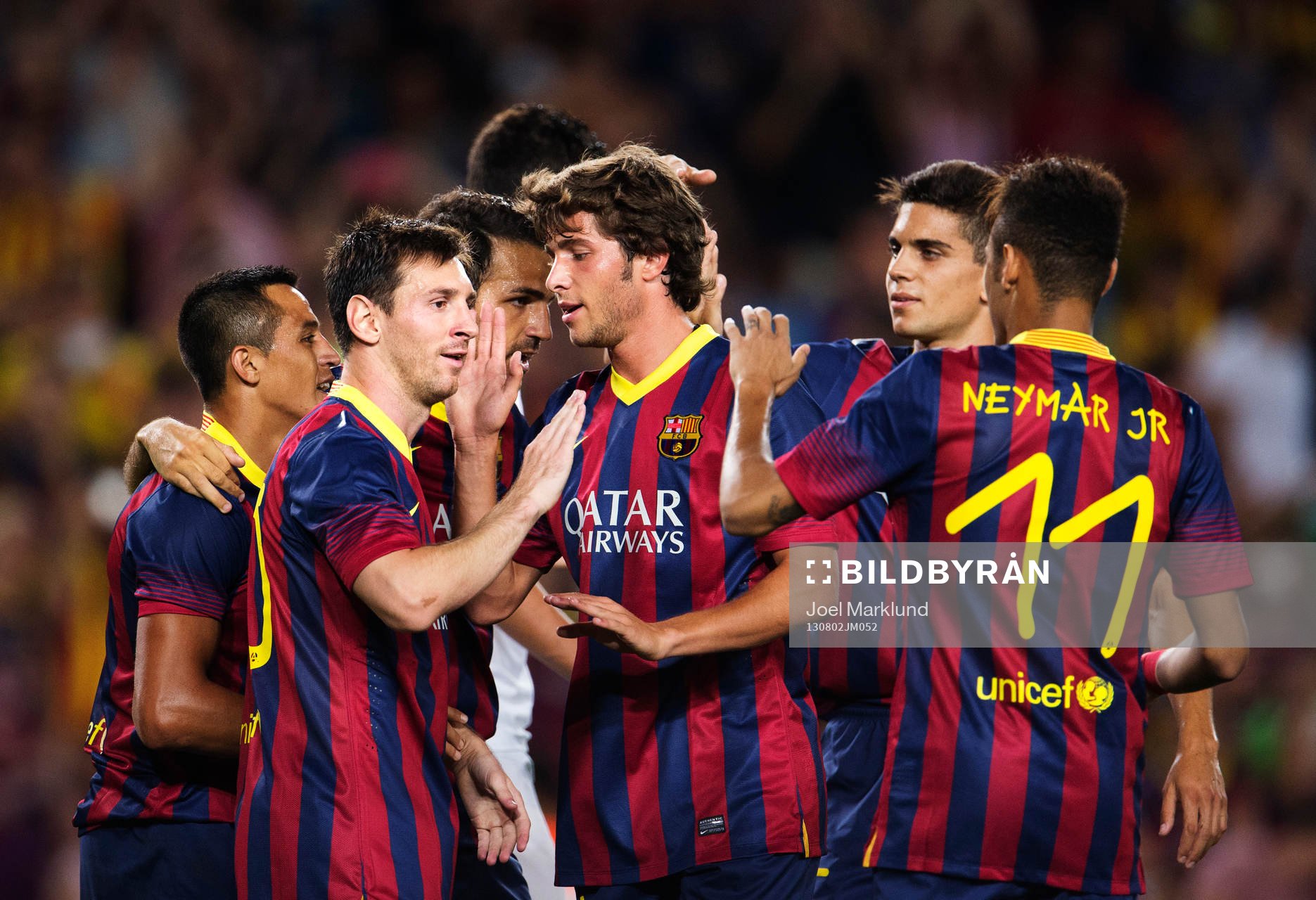 Barcelonas Lionel Messi (andra från vänster) och Neymar Jr (längst till höger) jublar efter 5-0-målet under fotbollsmatchen mellan Barcelona och Santos i Joan Gamper Trophy den 2 augusti 2013 i Barcelona, Spanien.