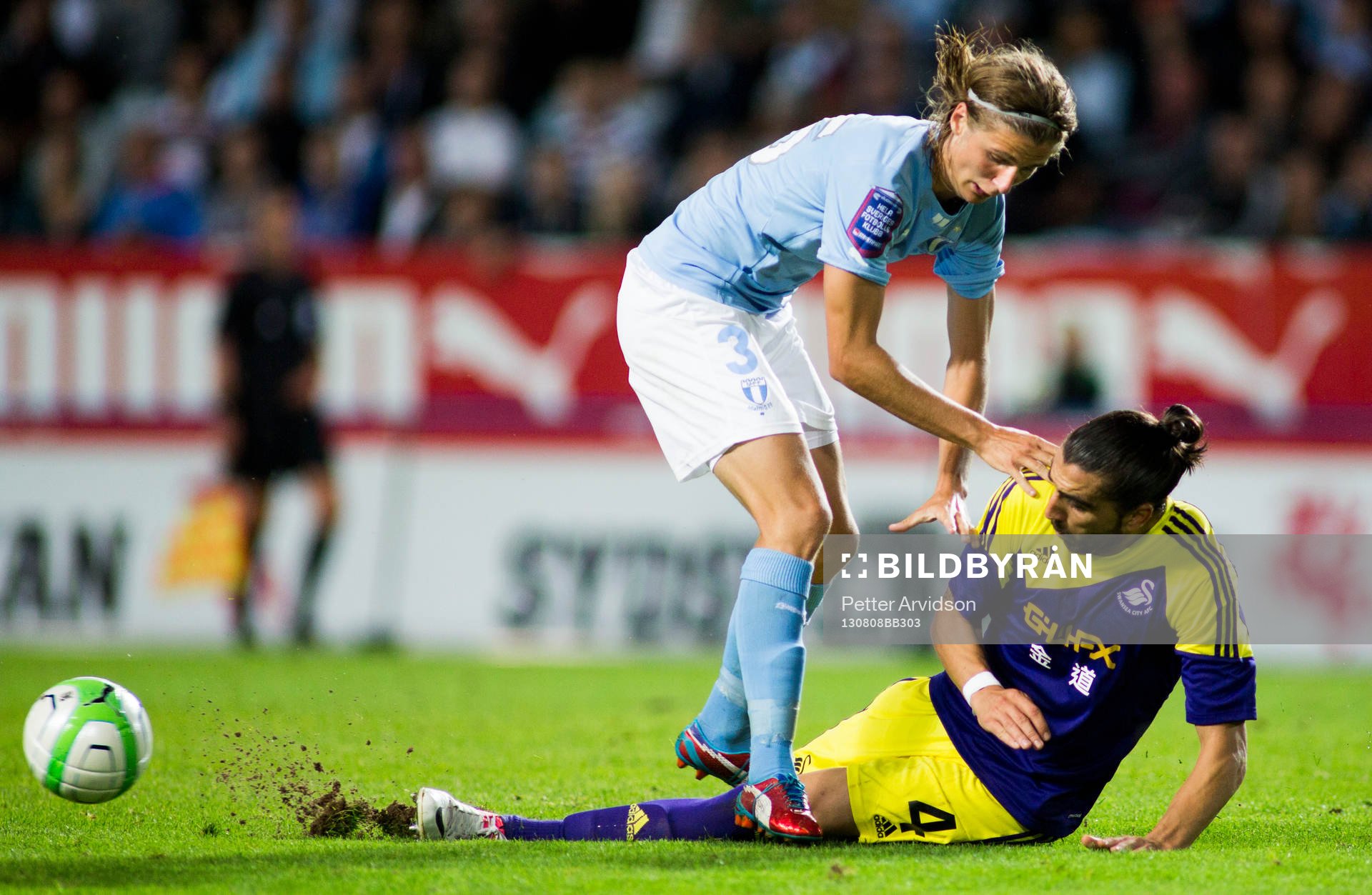 Malmö FFs Pawel Cibicki och Swanseas Chico Flores