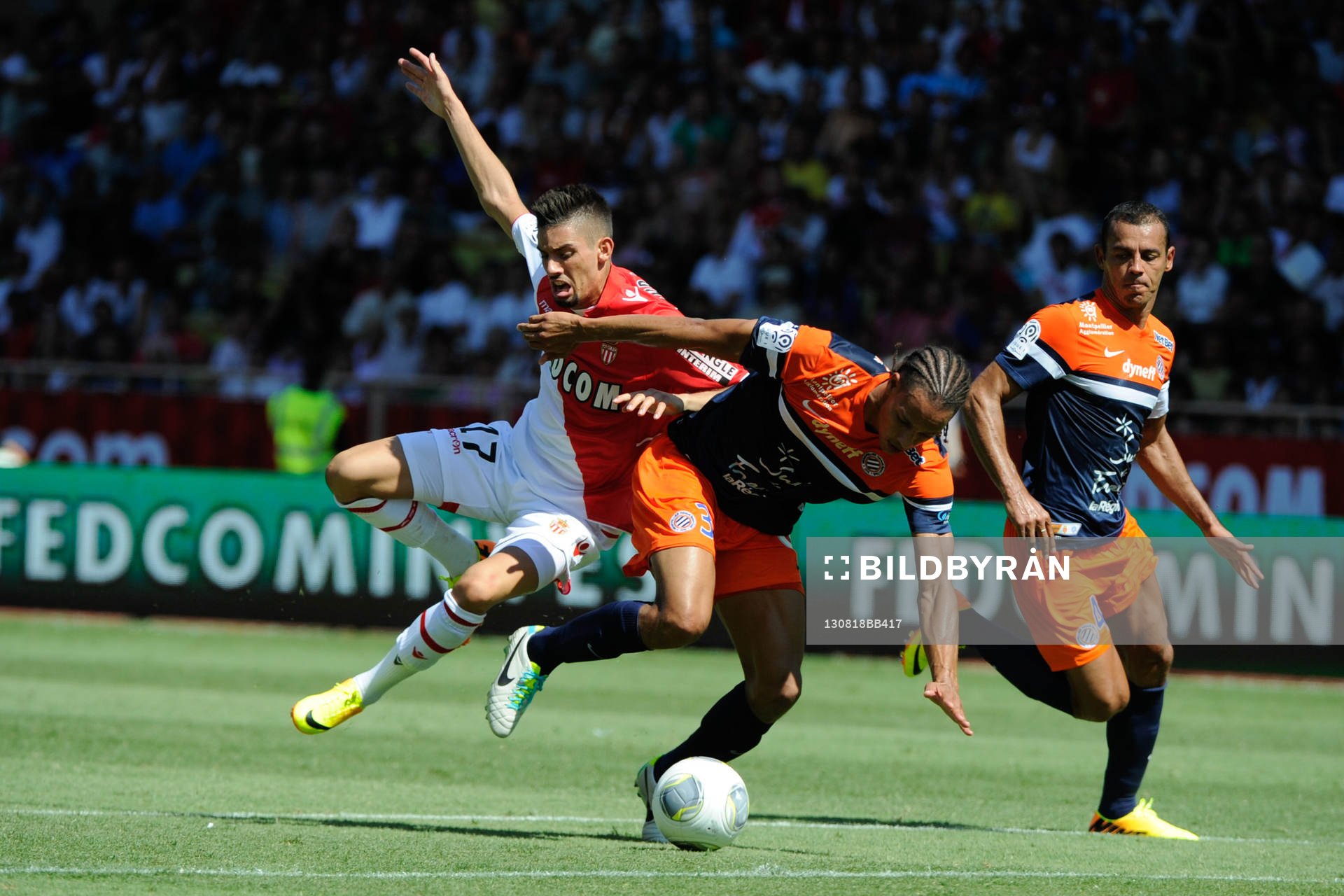 Fotboll, Franska ligan, Monaco - Montpellier: Yannick Carrasco / Daniel Congre (faute et expulsion de Daniel Congre) - 18.08.2013 - Monaco / Montpellier - 2eme journee de Ligue 1 -