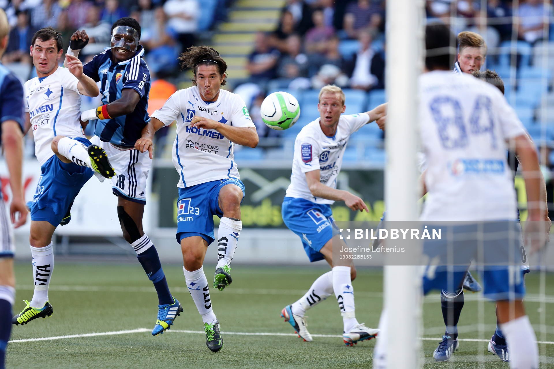 Norrköpings Nikola Tkalcic, Djurgårdens Daniel Amartey, Norrköpings David Boo Wiklander och Andreas Johansson i kamp om bollen framför Norrköpings mål i fotbollsmatchen mellan Norrköping och Djurgården i Allsvenskan i fotboll den 22 augusti 2013 i Norrköping.