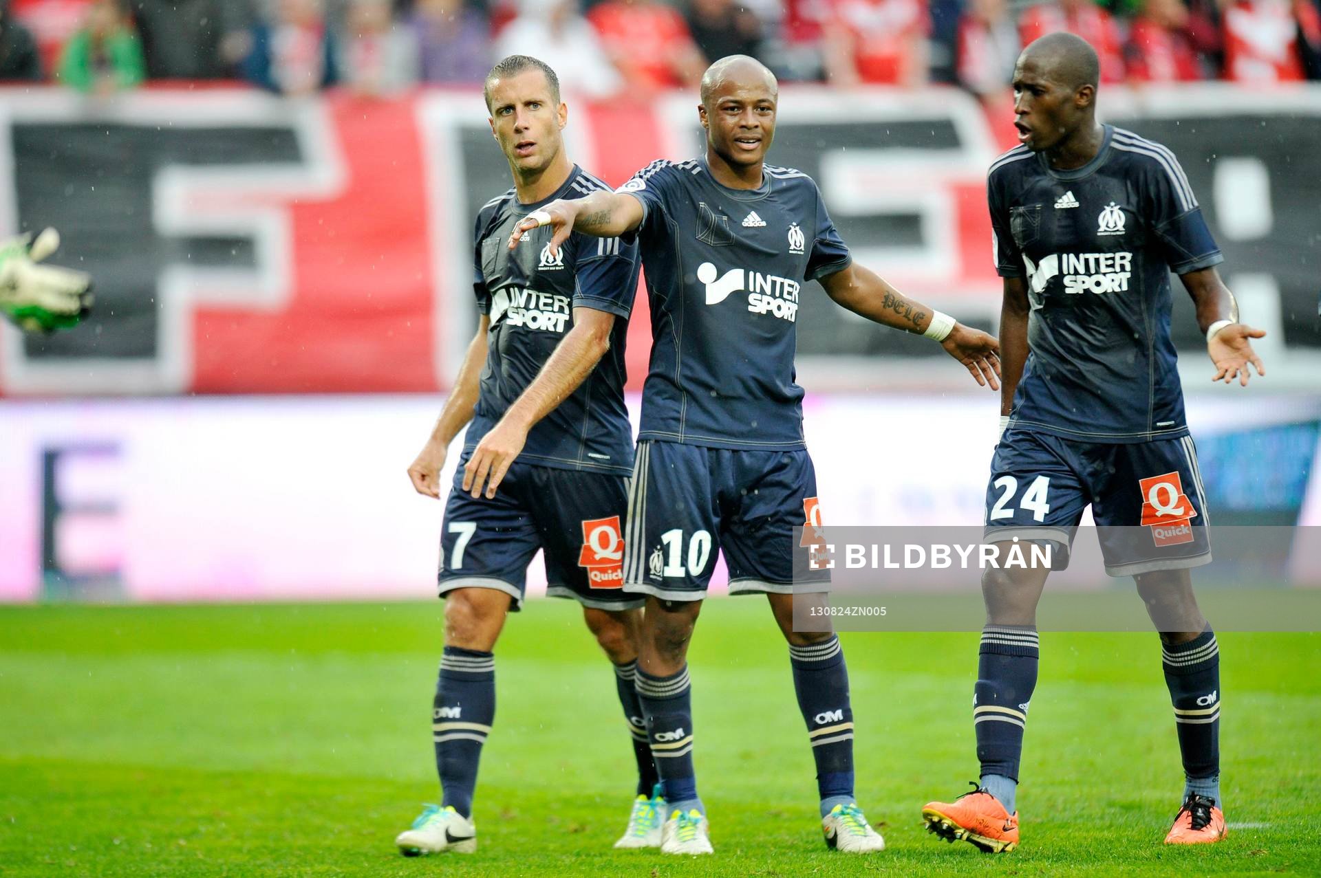  Fotboll, Lique 1, Valenciennes - Marseille: Benoit CHEYROU / Andre AYEW / Rod FANNI - 24.08.2013 - Valenciennes / Marseille - 3eme Journee de Ligue 1