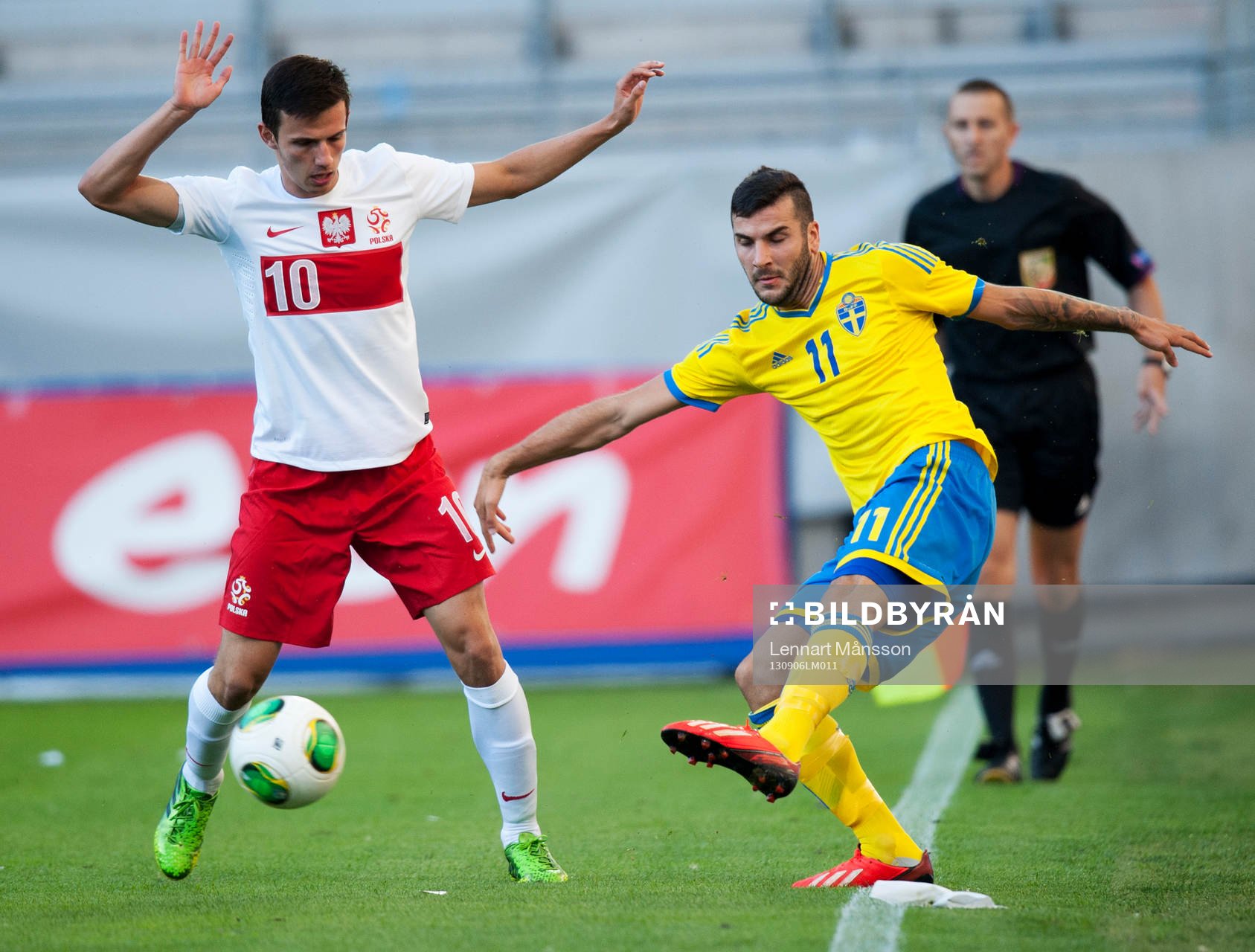 Mikael Ishak, Sverige, och Rafal Wolski, Polen, i