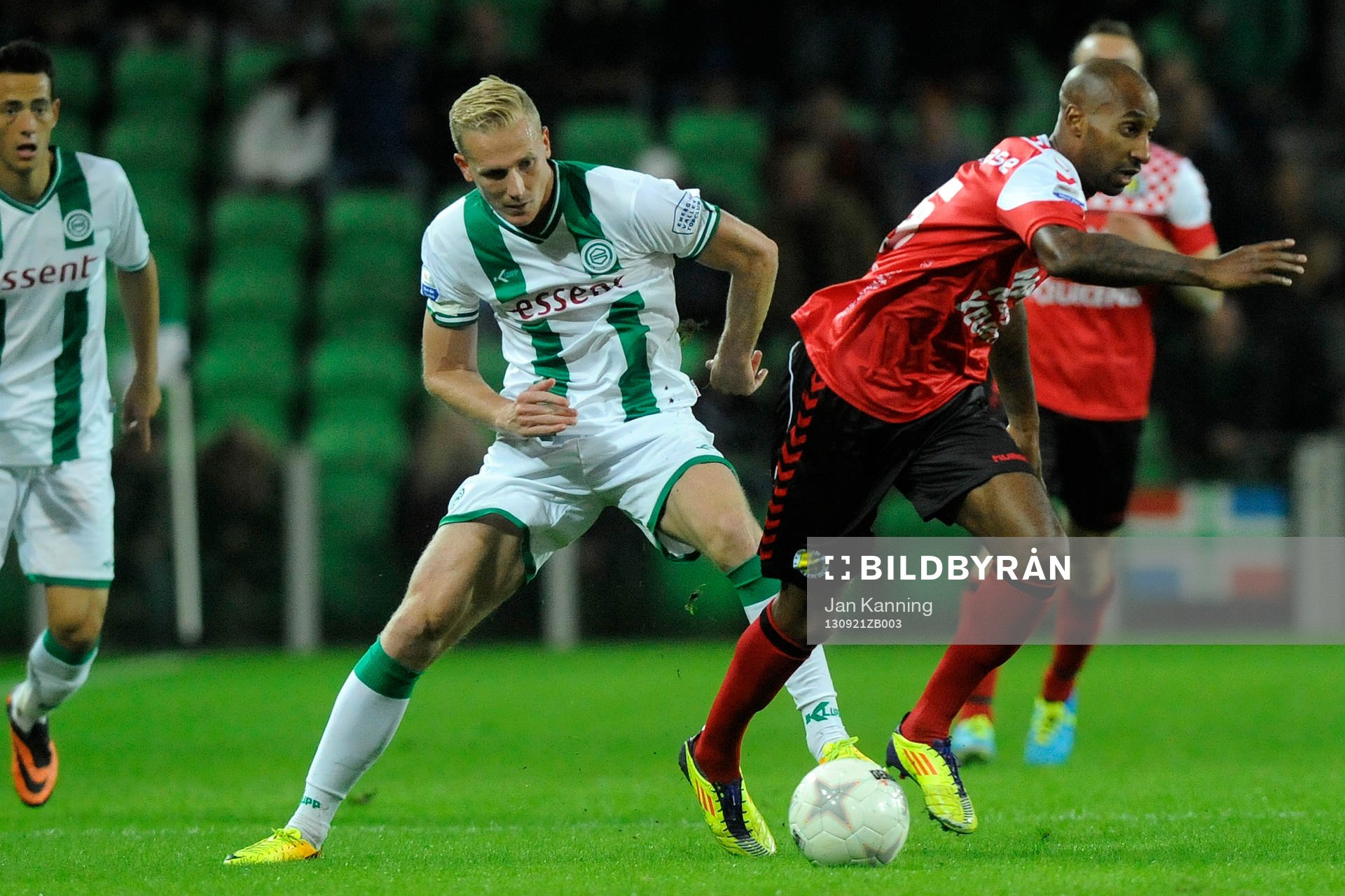  GRONINGEN - Voetbal, FC Groningen - RKC,  Eredivisie, stadion Euroborg, seizoen 2013-2014, 21-09-2013, RKC Waalwijk speler Romeo Castelen in duel met FC Groningen speler Nick van der Velden