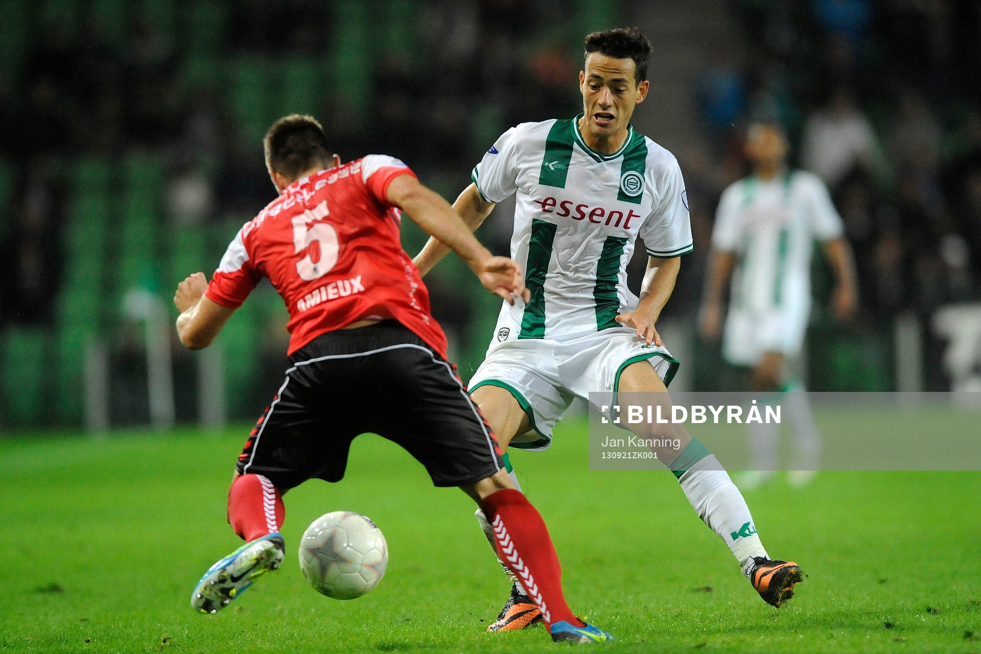  GRONINGEN - Voetbal, FC Groningen - RKC,  Eredivisie, stadion Euroborg, seizoen 2013-2014, 21-09-2013, RKC Waalwijk speler Remy Amieux met FC Groningen speler Krisztian Adorjan