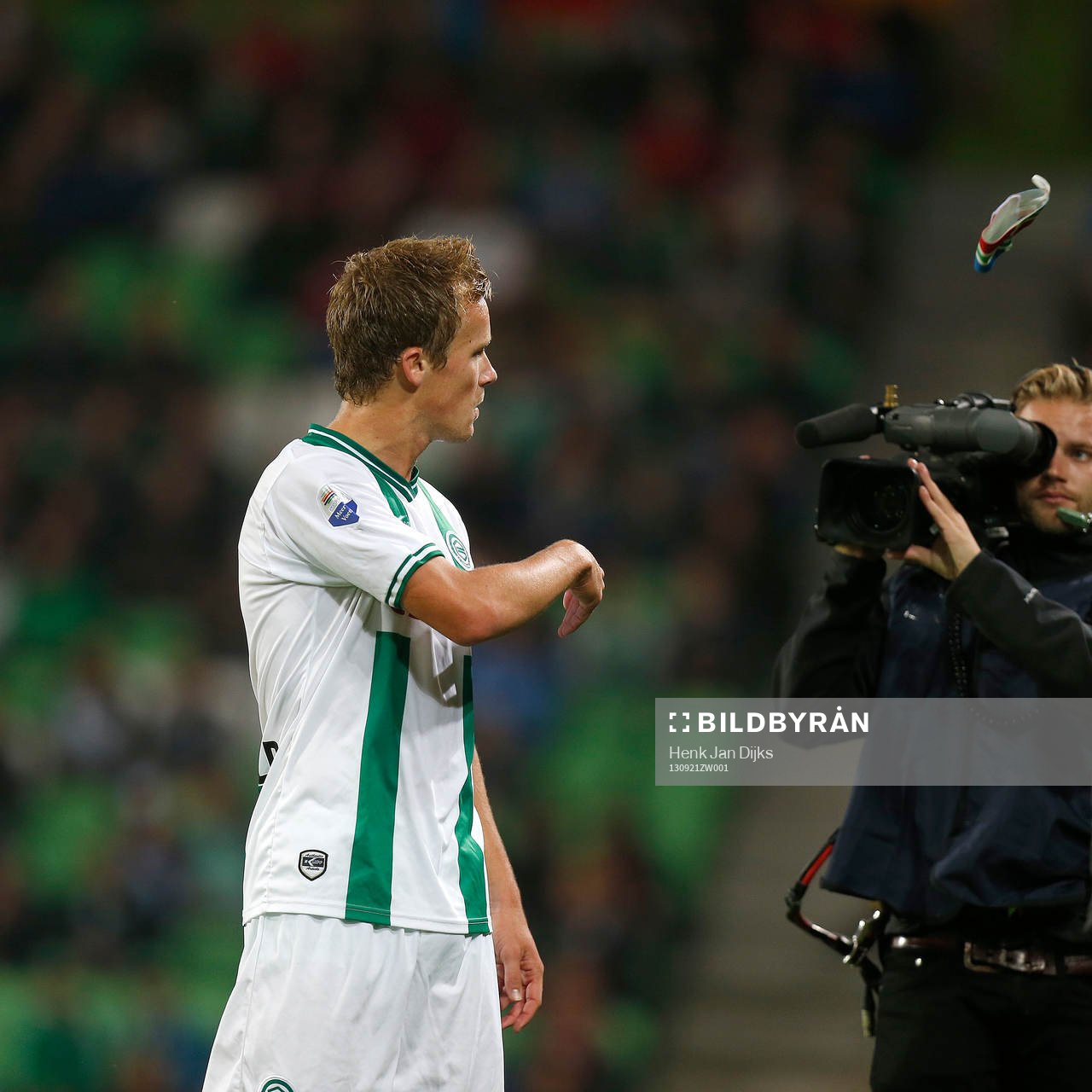 GRONINGEN - FC Groningen - RKC Waalwijk , Eredivisie, voetbal, seizoen 2013-2014, De Euroborg , 21-09-2013, FC Groningen speler Maikel Kieftenbelt gooit aanvoerdersband weg .