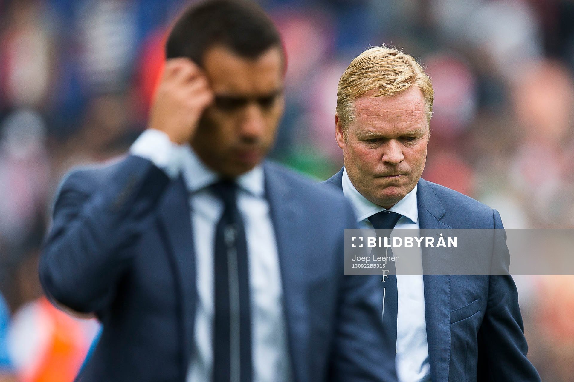 ROTTERDAM, Feyenoord - FC Utrecht, voetbal Eredivisie, seizoen 2013-2014, 22-09-2013, Stadion de Kuip, Feyenoord coach Ronald Koeman (R) is ondanks de overwinning niet tevreden, Feyenoord assistent coach Giovanni van Bronckhorst (L).