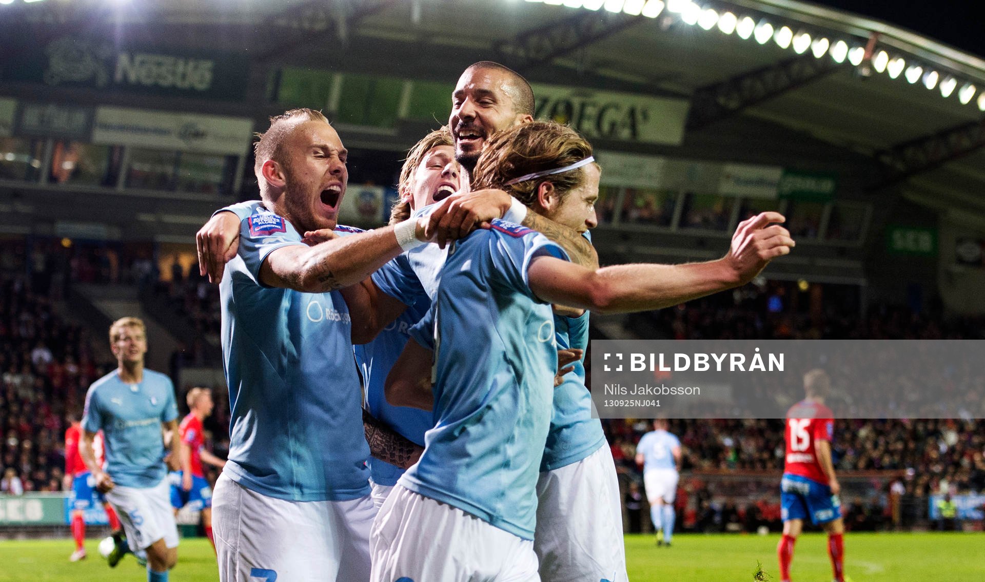 Malmös Magnus Eriksson, Guillermo Molins, Erik Friberg jublar under den allsvenska fotbollsmatchen mellan Helsingborg och Malmö FF den 25 september 2013 i Helsingborg.