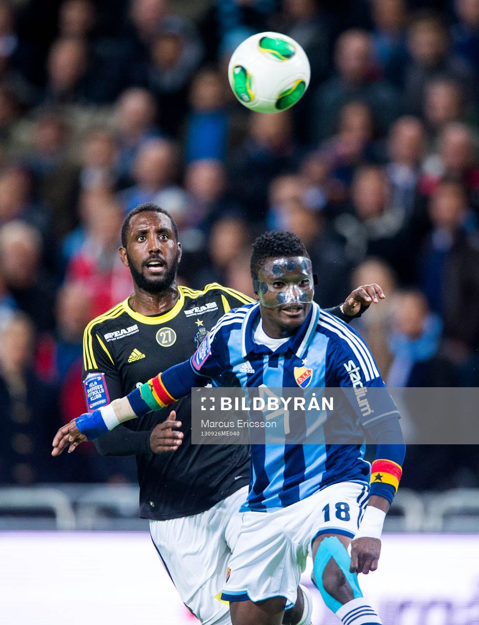 AIKs Henok Goitom och Djurgårdens Daniel Amartey under fotbollsmatchen i Allsvenskan mellan Djurgården och AIK den 26 september 2013 i Stockholm.