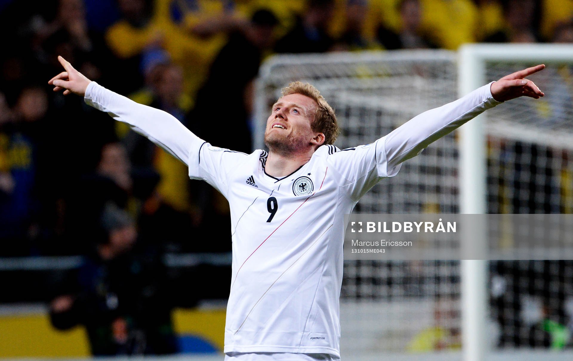 Tysklands André Schürrle jublar under fotbollsmatchen i VM-kvalet mellan Sverige och Tyskland den 15 oktober 2013 i Stockholm.
