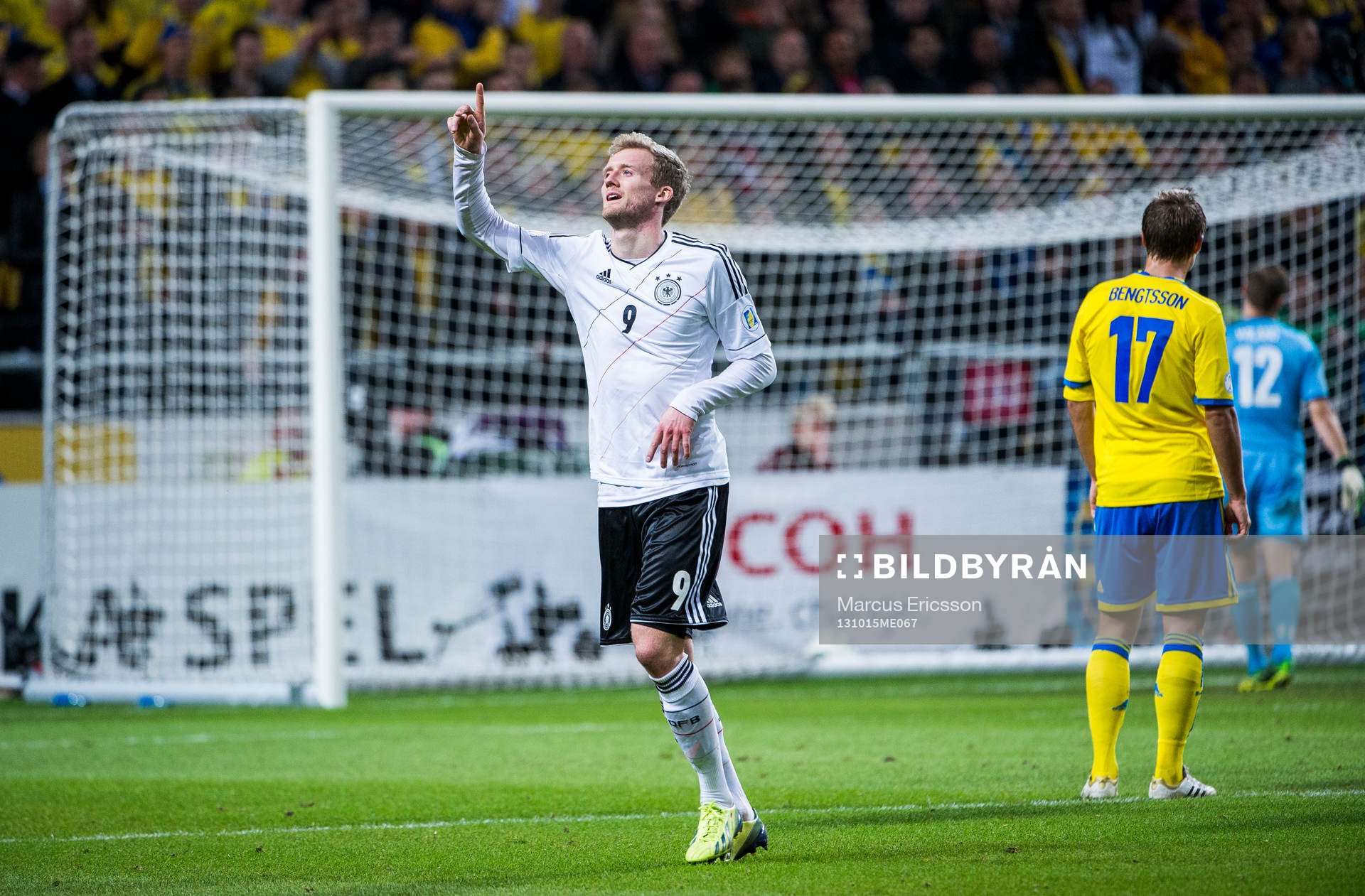 Tysklands André Schürrle jublar efter 5-3 under fotbollsmatchen i VM-kvalet mellan Sverige och Tyskland den 15 oktober 2013 i Stockholm.