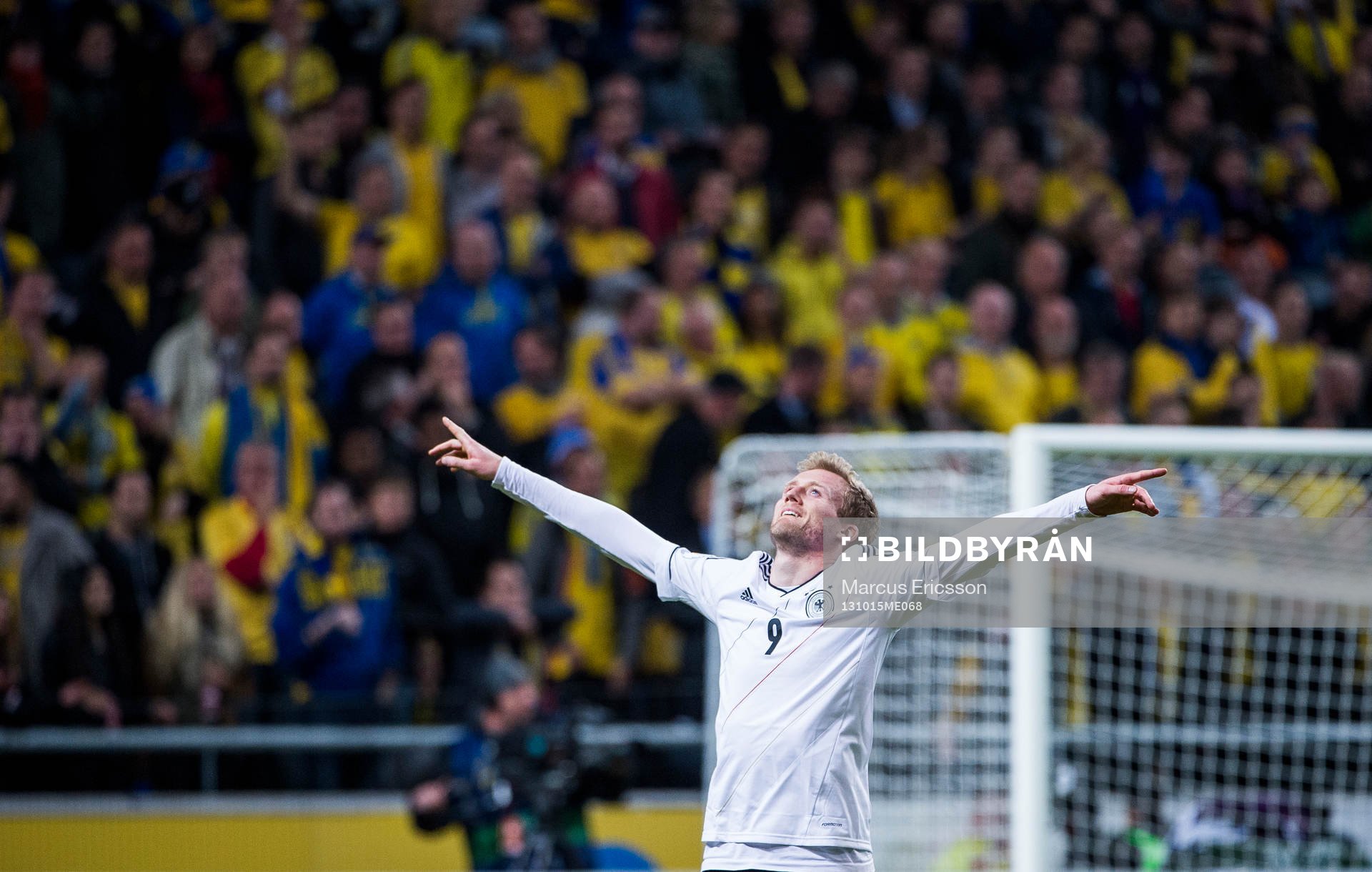 Tysklands André Schürrle jublar efter 5-3 under fotbollsmatchen i VM-kvalet mellan Sverige och Tyskland den 15 oktober 2013 i Stockholm.