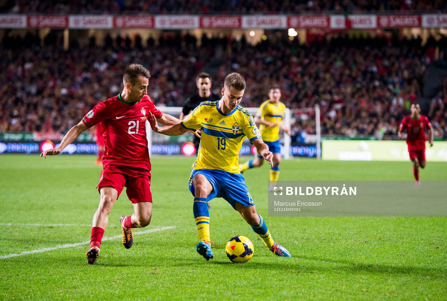 Portugals Joâo Pereira och Sveriges Alexander Kacaniklic