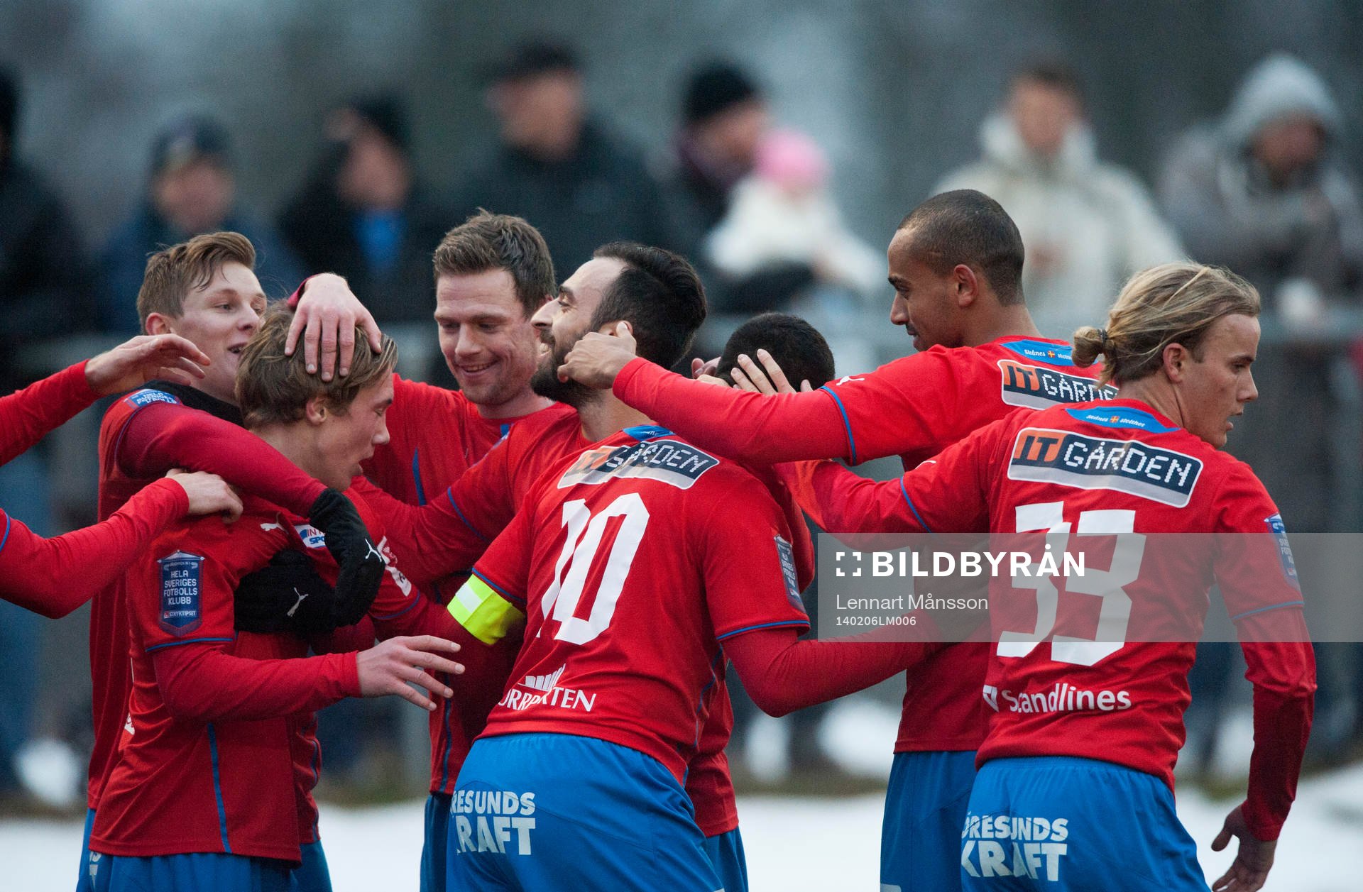Helsingborgs Gustav Jarl grattas efter att ha slagit passningen till Alvaro Santos som avgjort med 1-0 i träningsmatchen mellan Helsingborg och Odense i Helsingborg 6 februari 2014.
