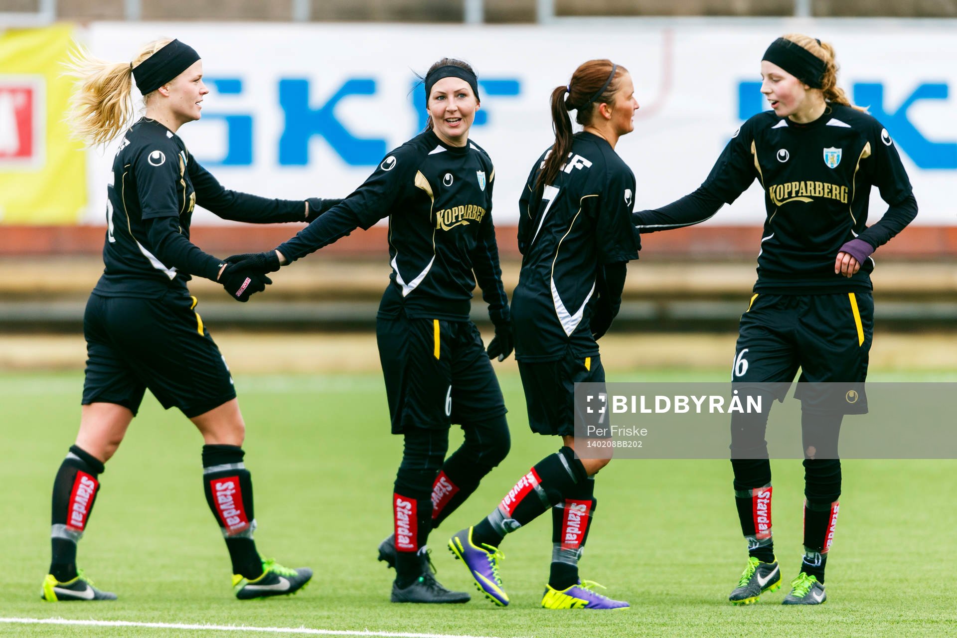 Kopparberg/Göteborgs Kathlene Fernström, Anna Ahlstrand, Cathrine Dyngvold och Amanda Edgren jublar efter 2-0 under träningsmatchen i fotboll mellan Kopparbergs/Göteborg och Hovås/Billdal den 8 februari 2014 i Göteborg .