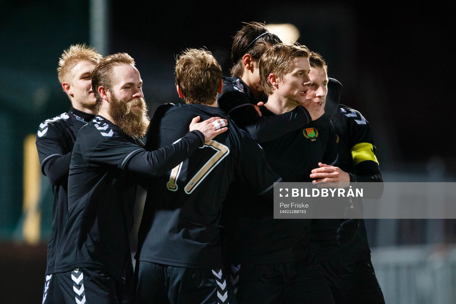 Gais Andreas Drugge gratuleras av Asgeir Börkur Asgeirsson, Gais Adam Eriksson, Mirza Mujcic och Kenneth Gustafsson efter 1-0 målet under träningsmatchen i fotboll mellan GAIS och Falkenberg den 12 februari 2014 i Göteborg .