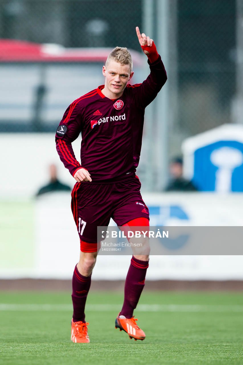 Ålborgs Kasper Kusk jublar efter att han gjort 1-0 under träningsmatchen i fotboll mellan IFK Göteborg - Ålborg den 15 februari 2014 i Göteborg.