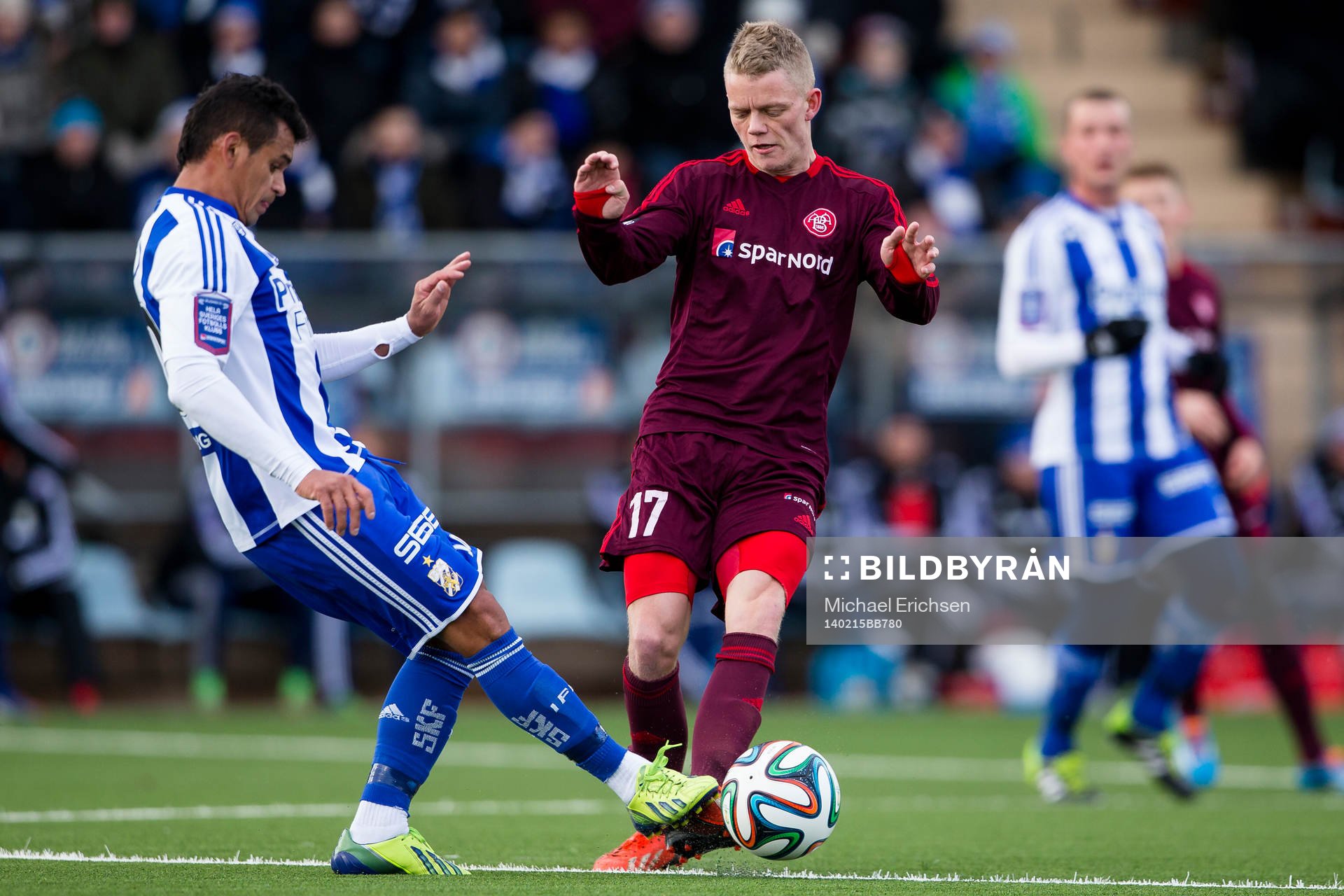 IFK Göteborgs Daniel Sobralense i kamp med Ålborgs Kasper Kusk under träningsmatchen i fotboll mellan IFK Göteborg - Ålborg den 15 februari 2014 i Göteborg.