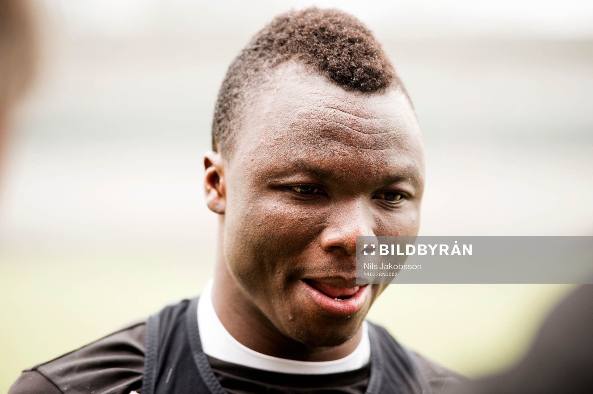 Dominic Adiyiah provtränar under Malmö FFs träning den 28 februari 2014 i Malmö.