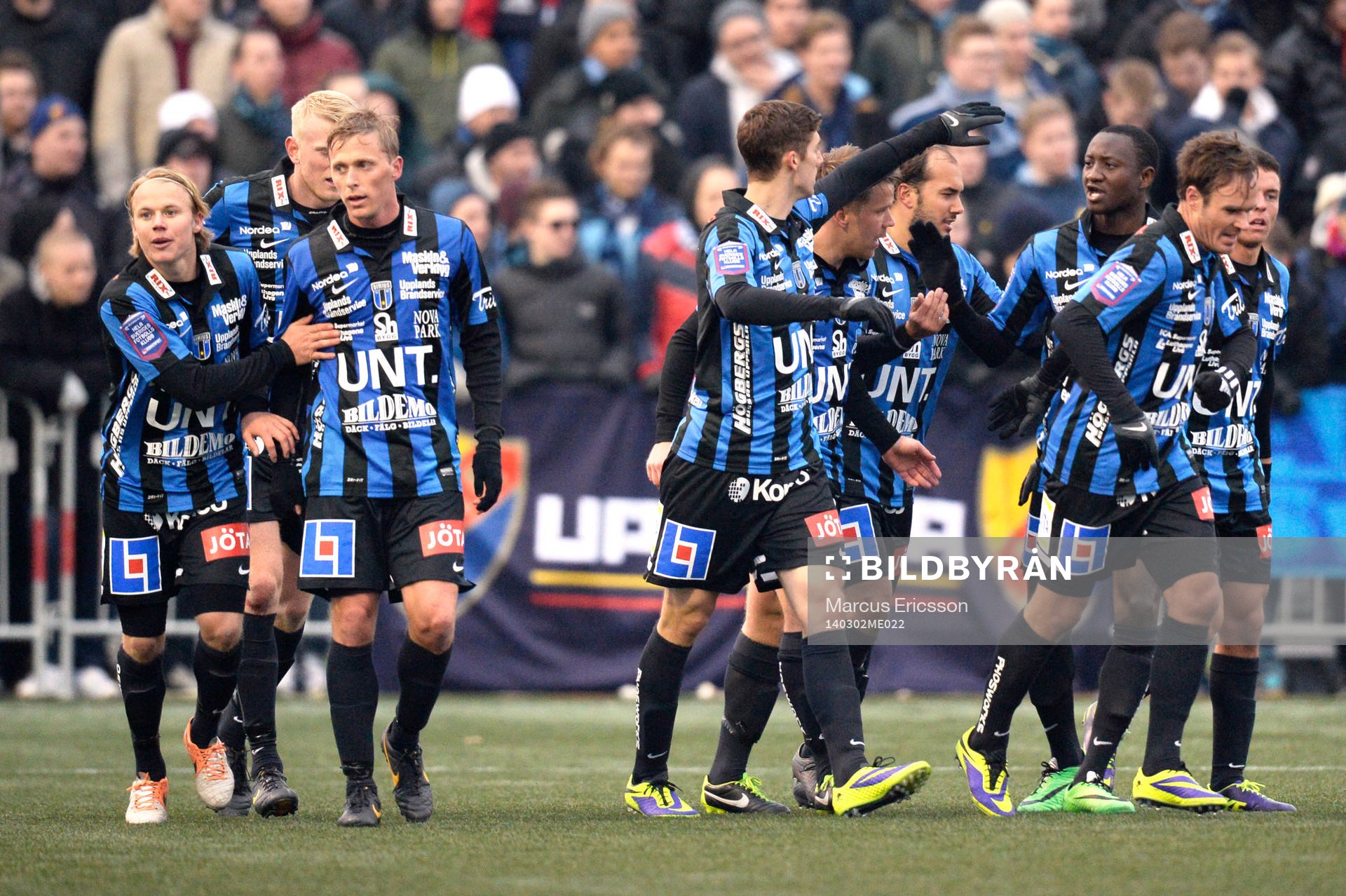 Sirius spelare jublar efter Niklas Thor gjort 1-1 under fotbollsmatchen mellan Sirius och Djurgården i Svenska Cupen den 02 mars 2014 i Stockholm.