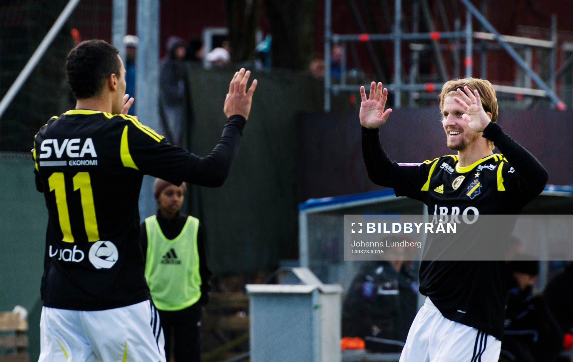 AIKs Nabil Bahoui ocg Martin Lorentzon jublar under en träningsmatch i fotboll mellan AIK och Kalmar den 23 mars 2014 i Stockholm.