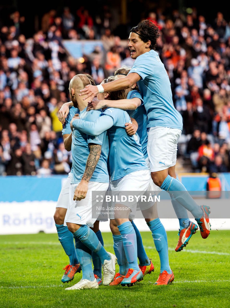 Malmö FFs Miiko Albornoz kommer hoppandes när Magnus Eriksson gjort 1-0 och jublar under den allsvenska fotbollsmatchen mellan Malmö FF och Falkenberg den 30 mars 2014 i Malmö.