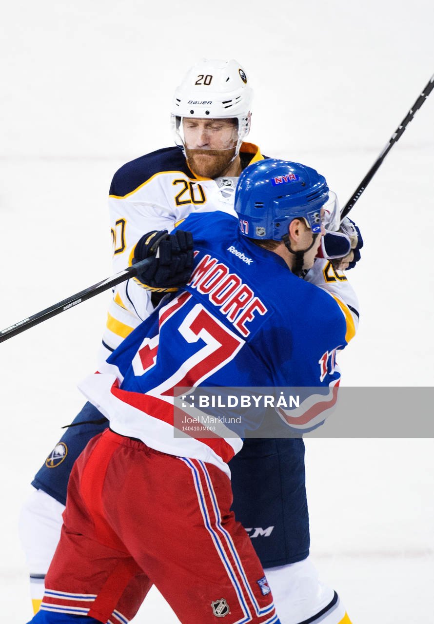 Buffalos Henrik Tallinder tacklar New Yorks John Moore
