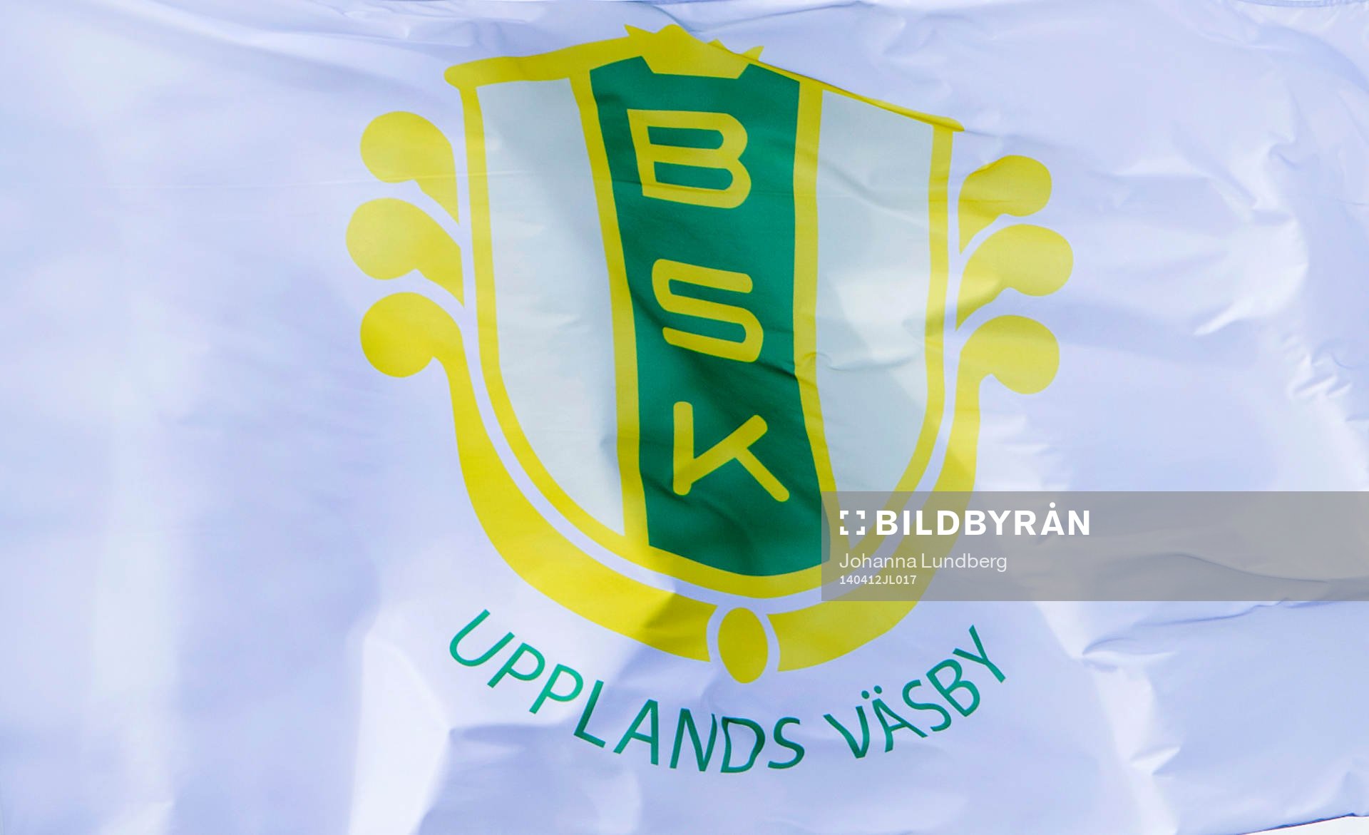 En flagga med Bollstanäs emblem