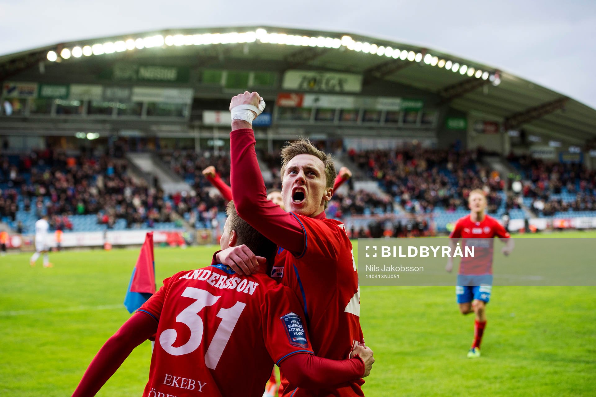 Helsingborgs Elias Andersson och Anton Kinnander jublar under den allsvenska fotbollsmatchen mellan Helsingborg och Häcken den 13 april 2014 i Helsingborg.