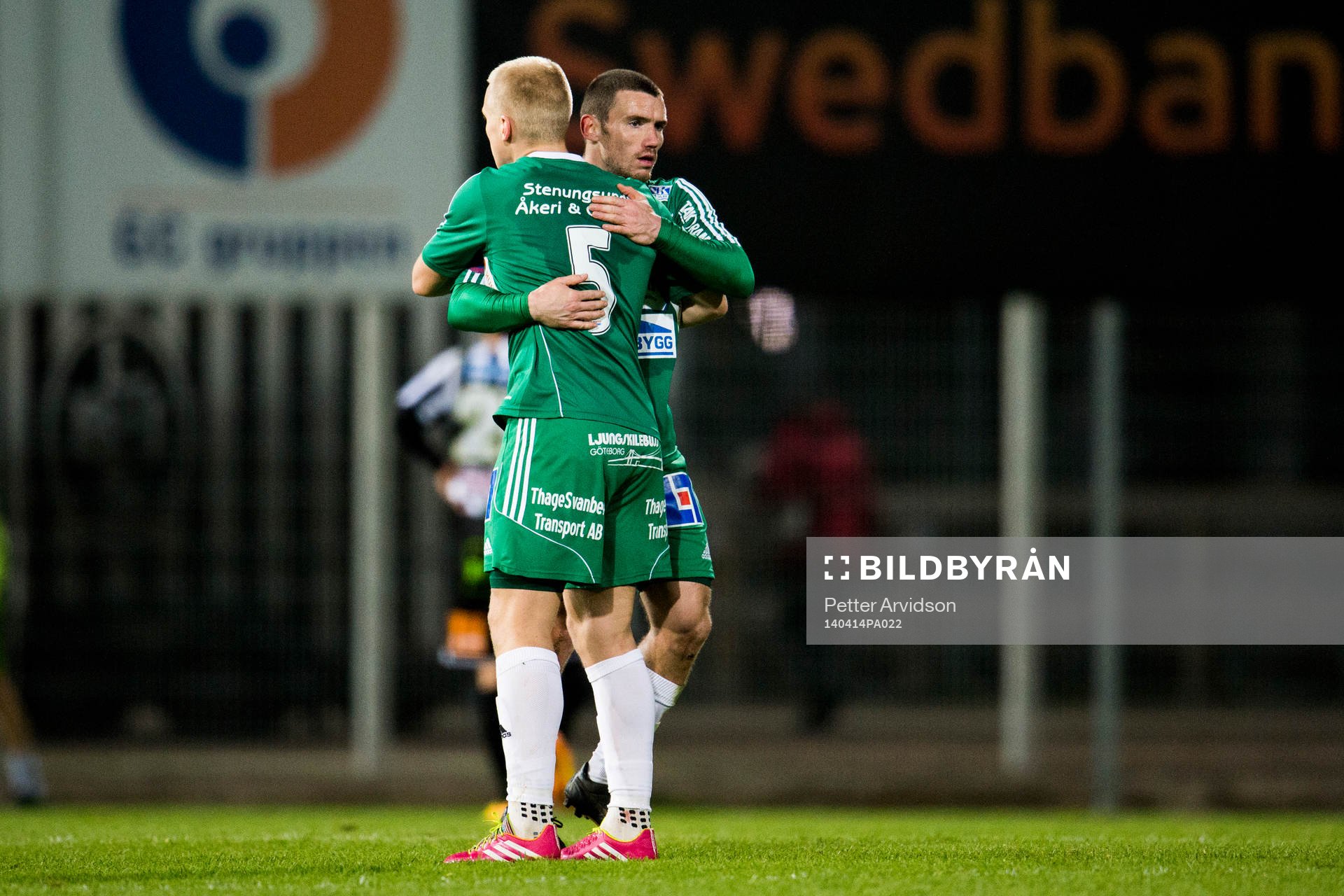 Ljungskiles Petter Björlund och James Sinclair efter fotbollsmatchen i Superettan mellan Landskrona BOIS och Ljungskile den 14 april 2014 i Landskrona.
