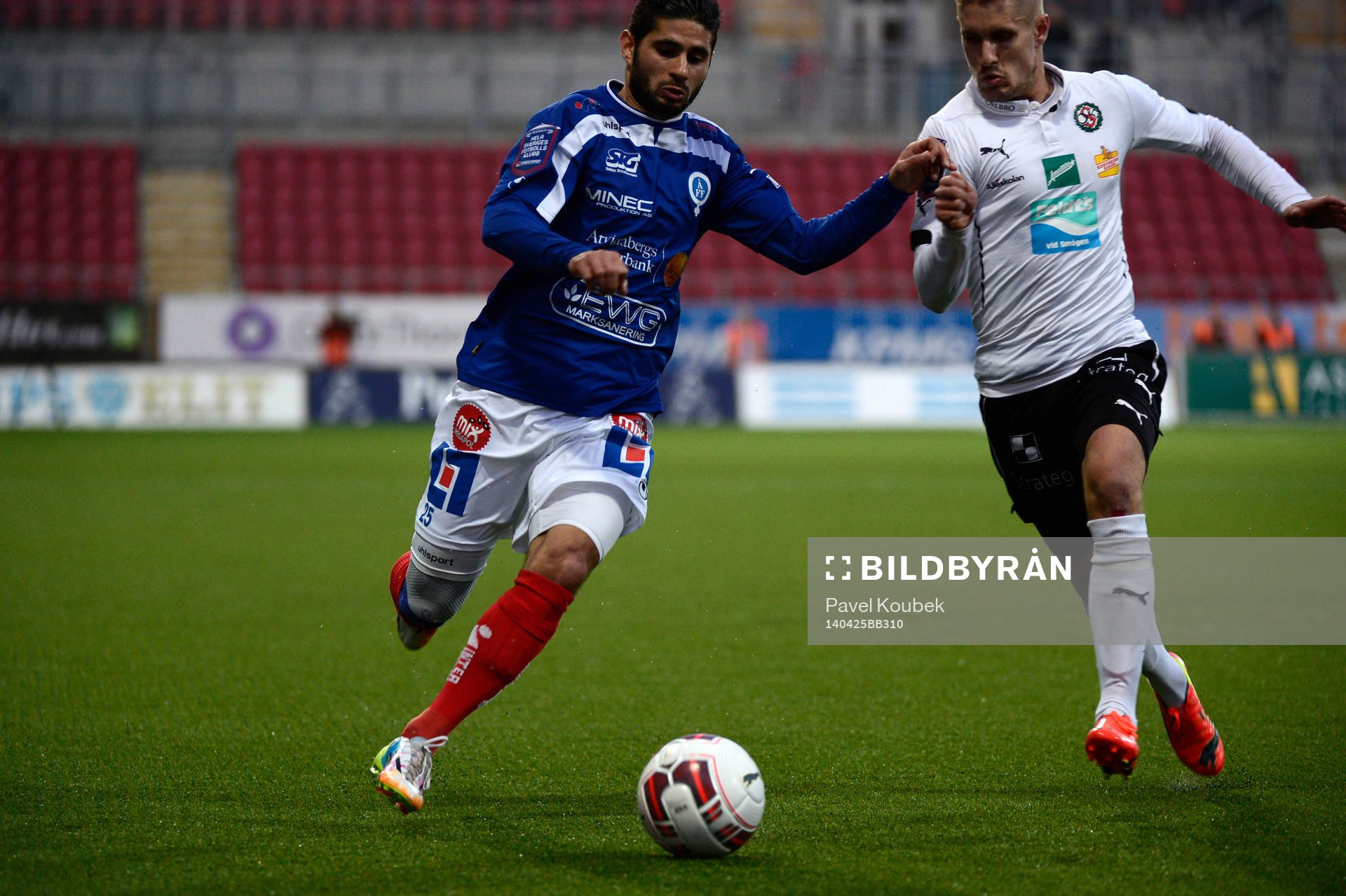 Imad Zatara i duell med Daniel Björnqvist under en match i allsvenskan mellan Örebro och Åtvidaberg den 03 april 2012 i Örebro.