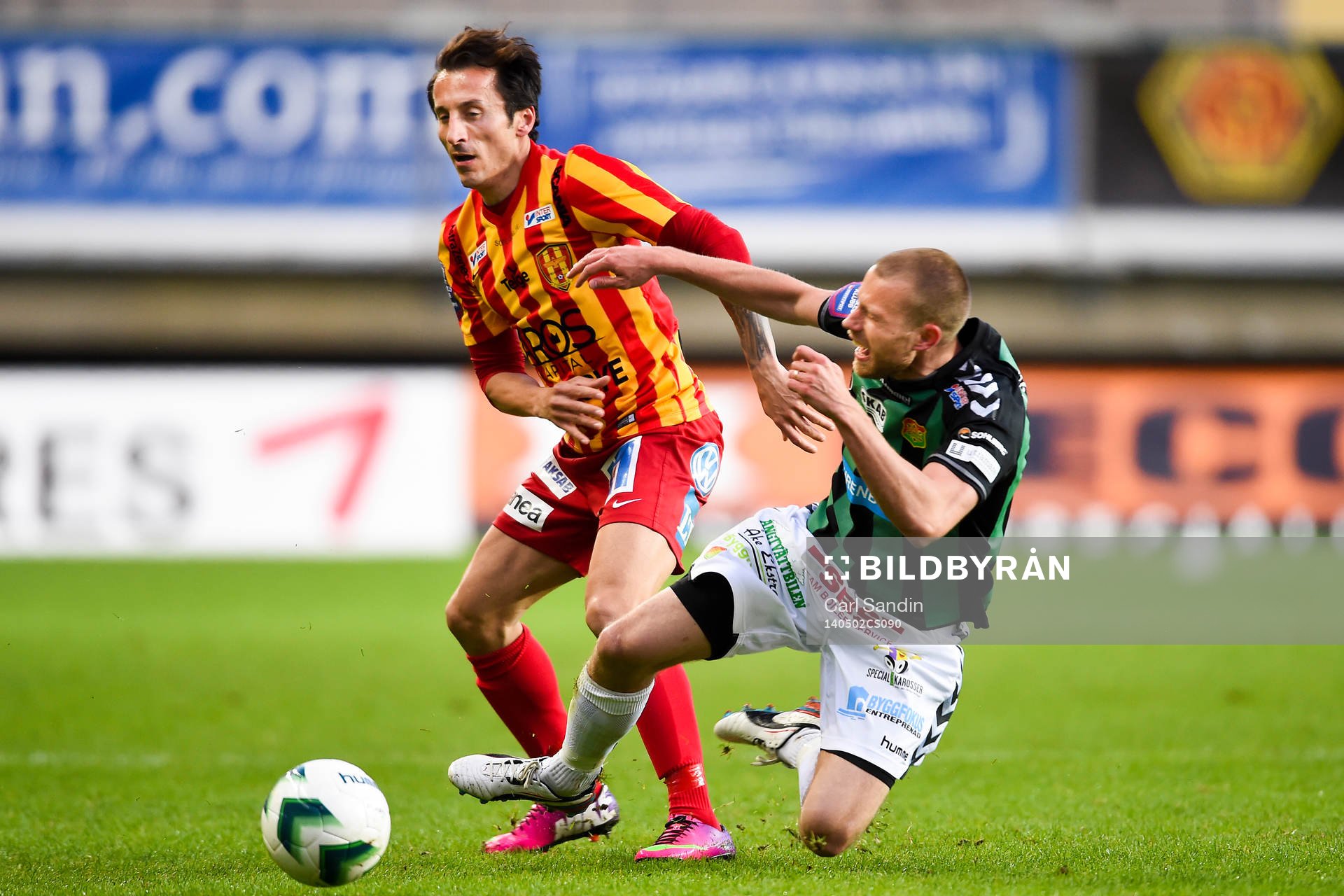 Syrianskas Louay Chanko i kamp med GAIS Joel Johansson under fotbollsmatchen i Superettan mellan GAIS och Syrianska den 2 maj 2014 i Göteborg.