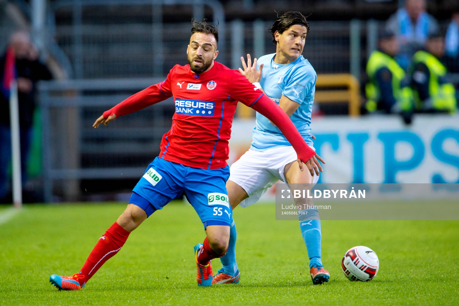 Helsingborgs Abdul Khalili i kamp om bollen med Malmö FFs Miiko Albornoz under matchen i Allsvenskan mellan Helsingborg och Malmö FF den 8 maj 2014 i Helsingborg.