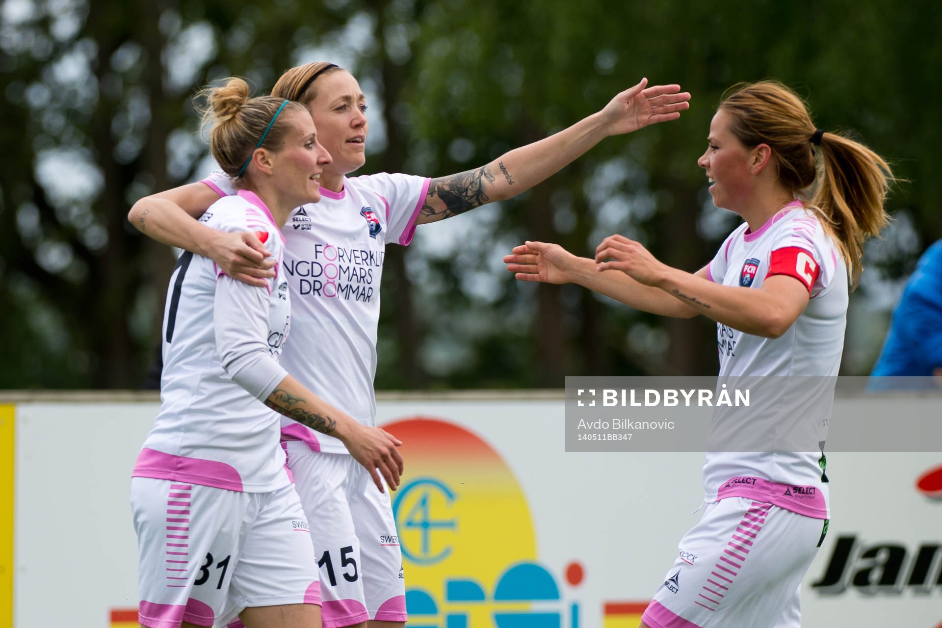 Rosengårds Anja Mittag, Therese Sjögran och Sara Björk Gunnarsdottir jublar efter 1-0 målet under fotbollsmatchen i Damallsvenskan mellan Kristianstad och Rosengård den 11 maj 2014 i Kristianstad