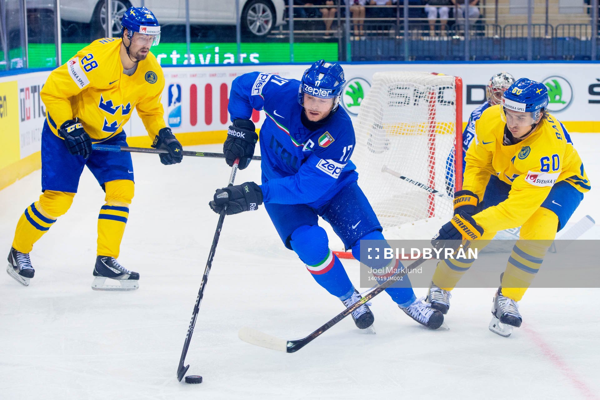 Sveriges Dick Axelsson och Mikael Backlund jagar Italiens