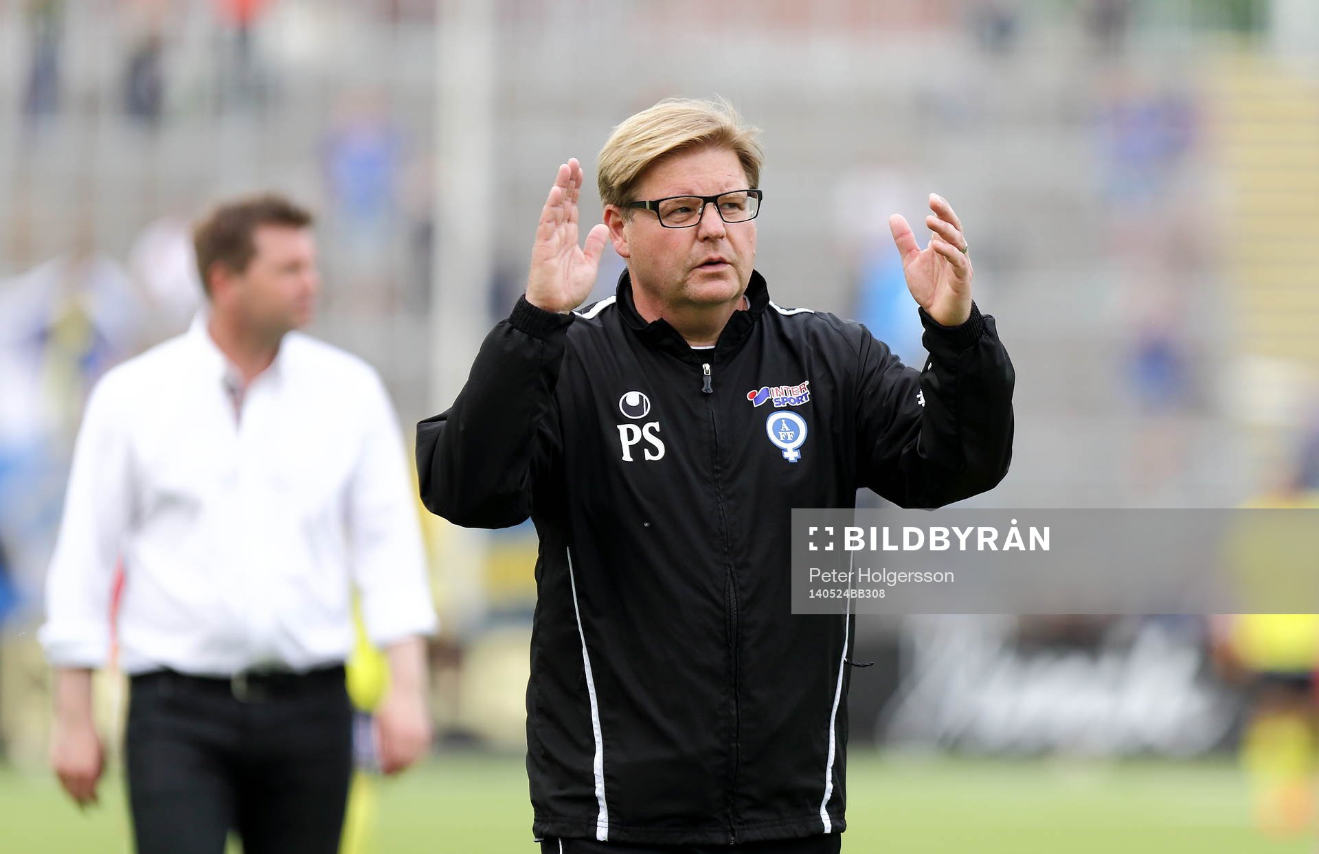 Halmstads tränare Jens Gustafsson och Åtvidabergs Tränare Peter Swärdh under fotbollsmatchen i Allsvenskan mellan Åtvidaberg och Halmstad den 12 maj 2014 i Åtvidaberg.