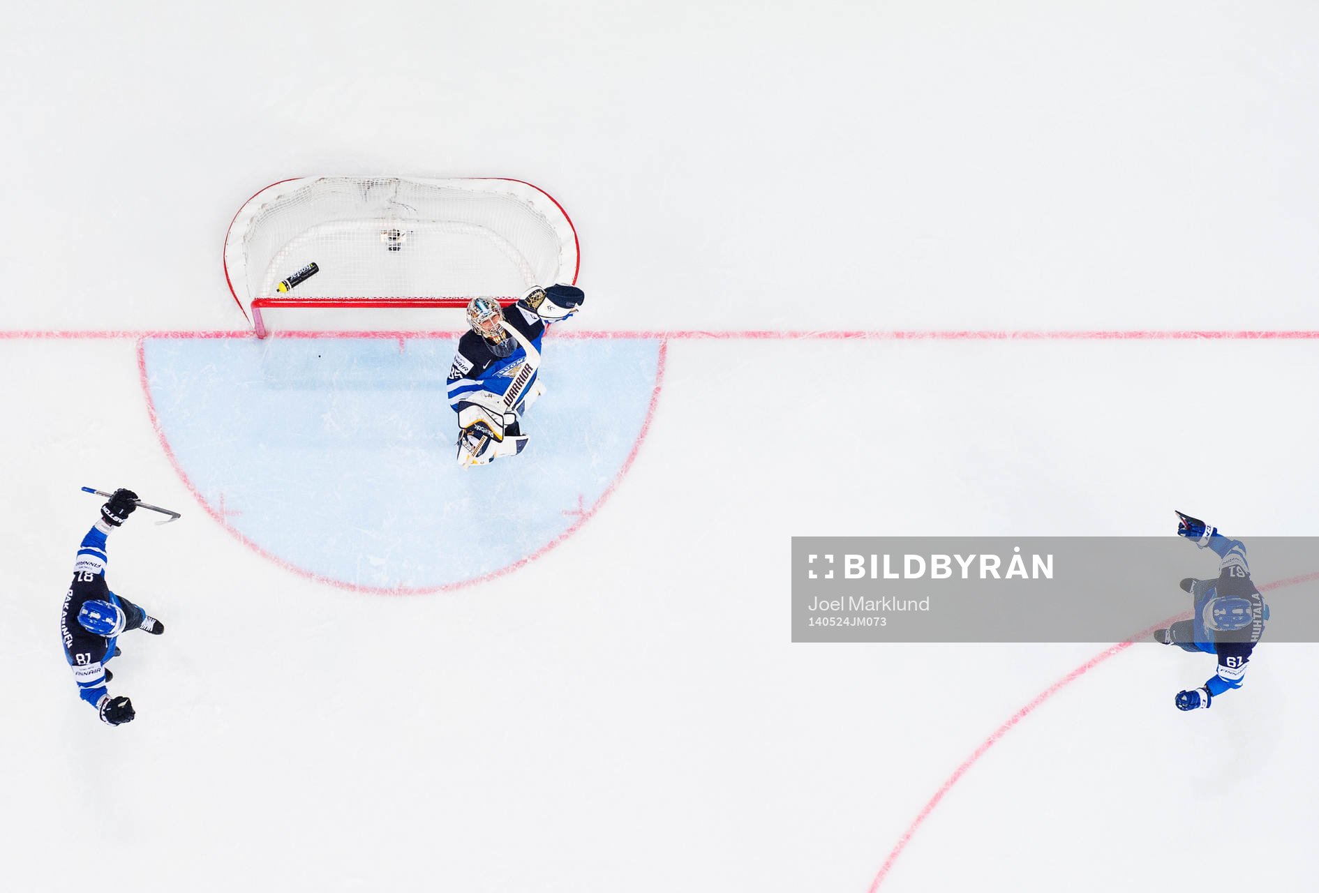 Finlands Iiro Pakarinen, målvakt Pekka Rinne och Tommi