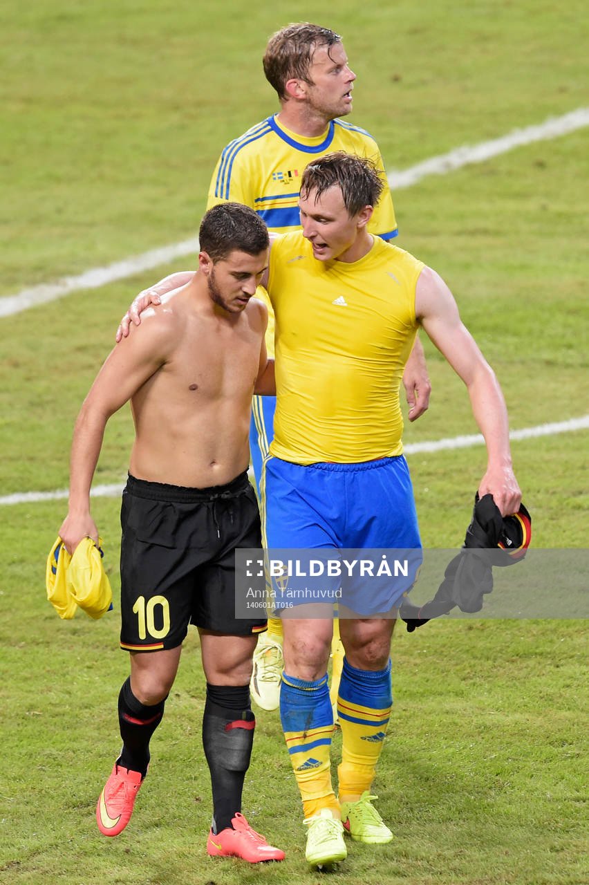 Belgiens Eden Hazard  och Sveriges Kim Källström