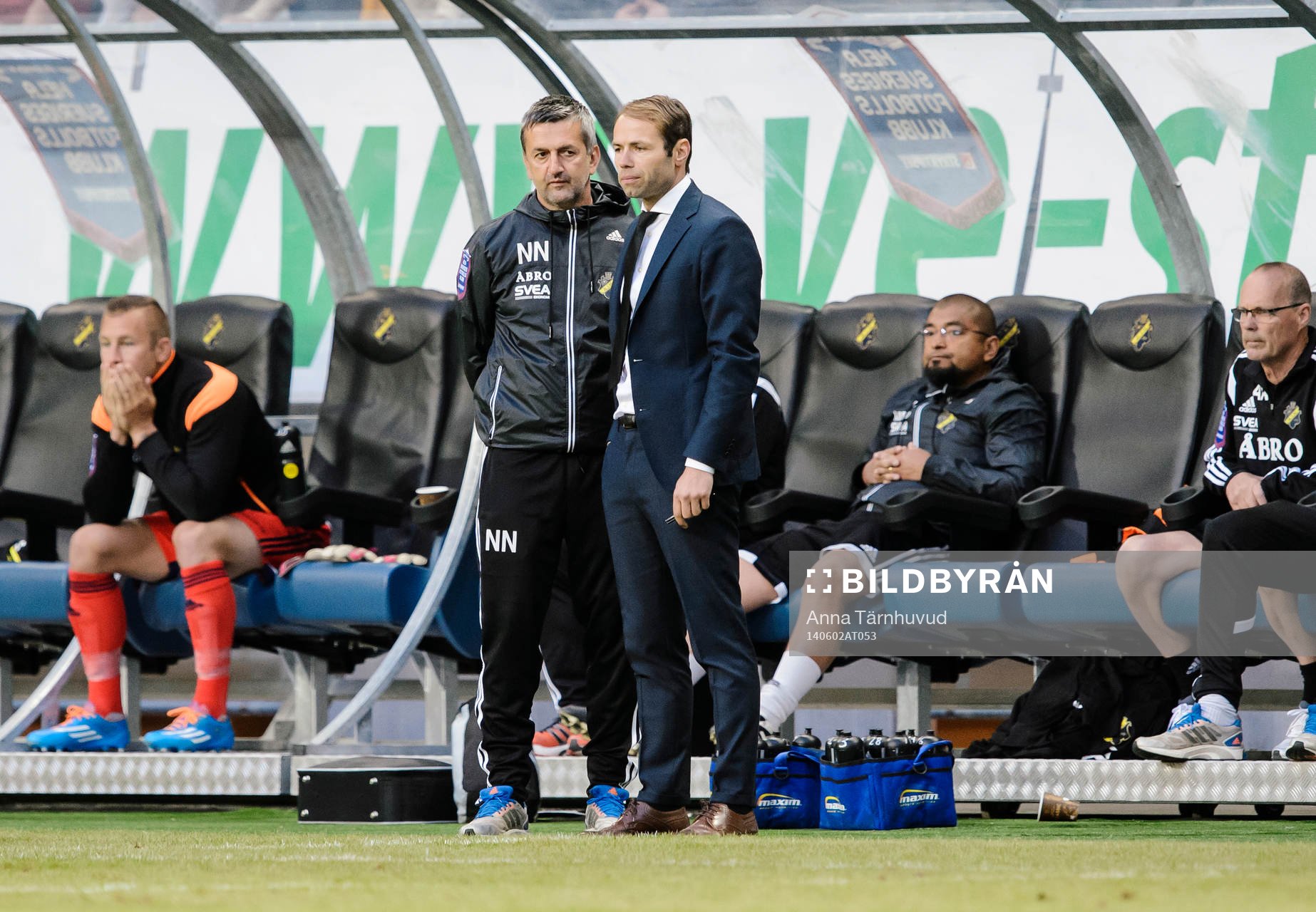 AIK:s tränare Andreas Alm och assisterande tränare Nebojsa Novakovic under fotbollsmatchen i Allsvenskan mellan AIK och Brommapojkarna den 2 juni 2014.