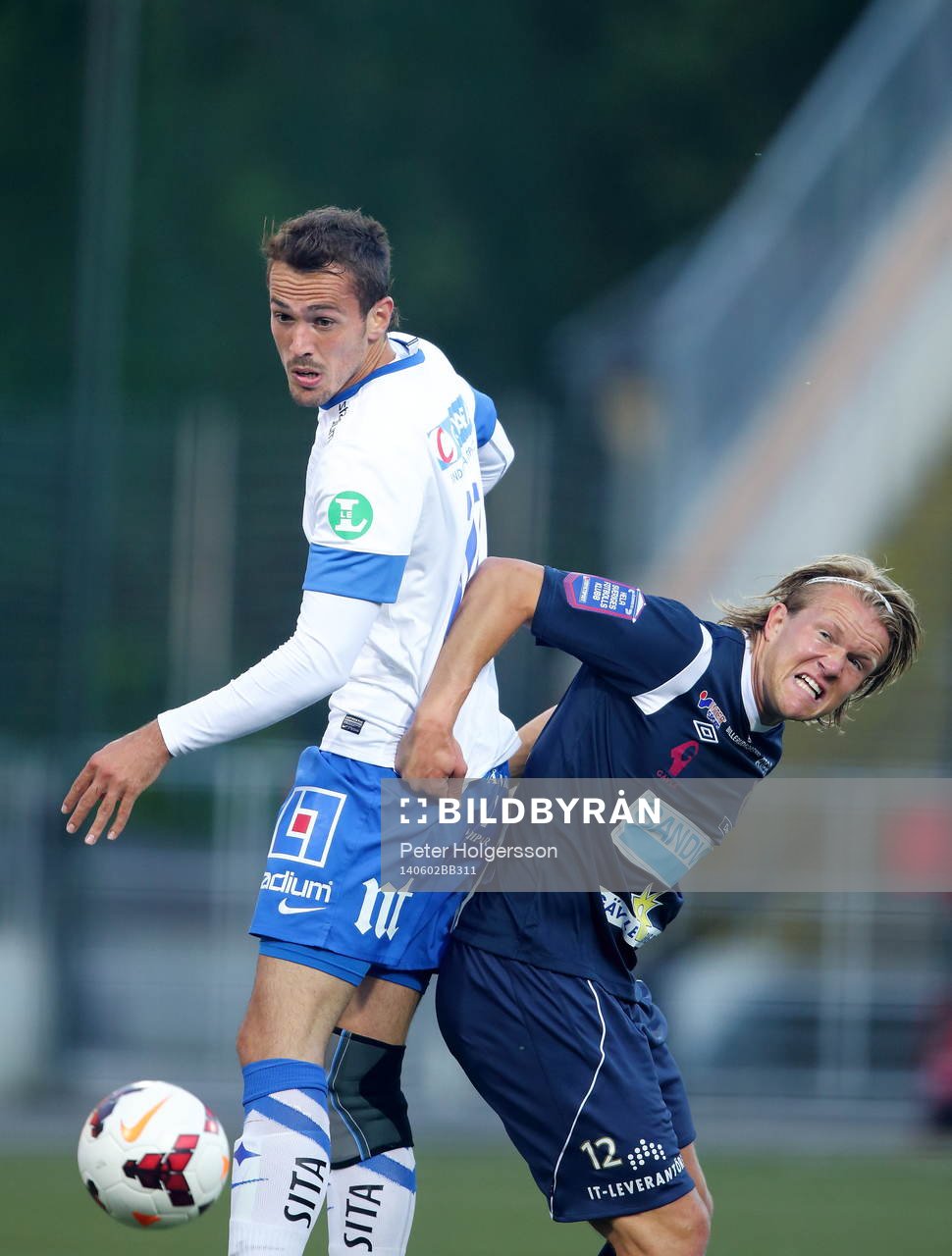Norrköpings Emir Kujovic och Gefles Anders Bååth under fotbollsmatchen i Allsvenskan mellan Norrköping och Gefle den 02 juni 2014 i Norrköping.