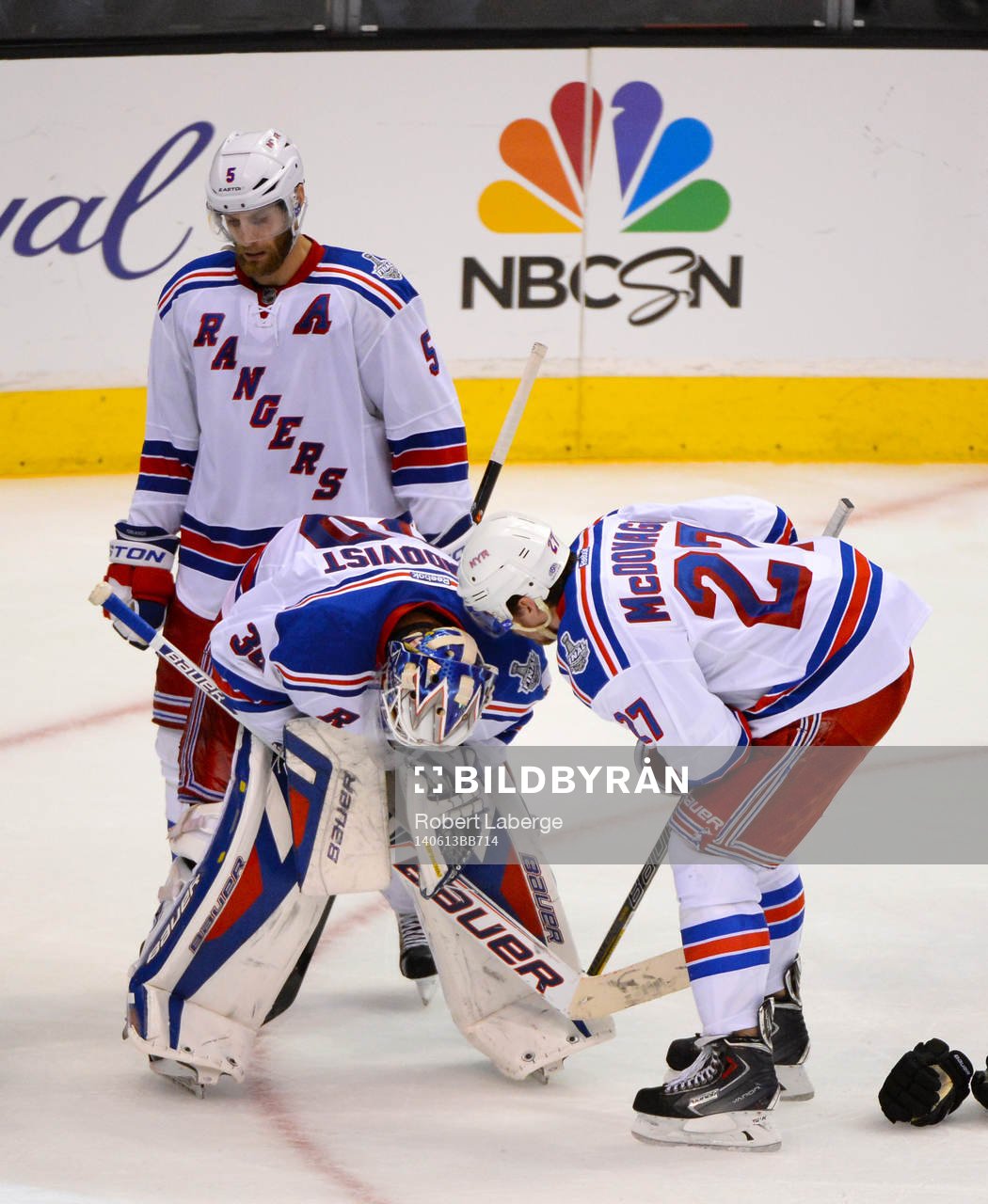 Henrik Lundqvist of the New York Rangers and his teammates