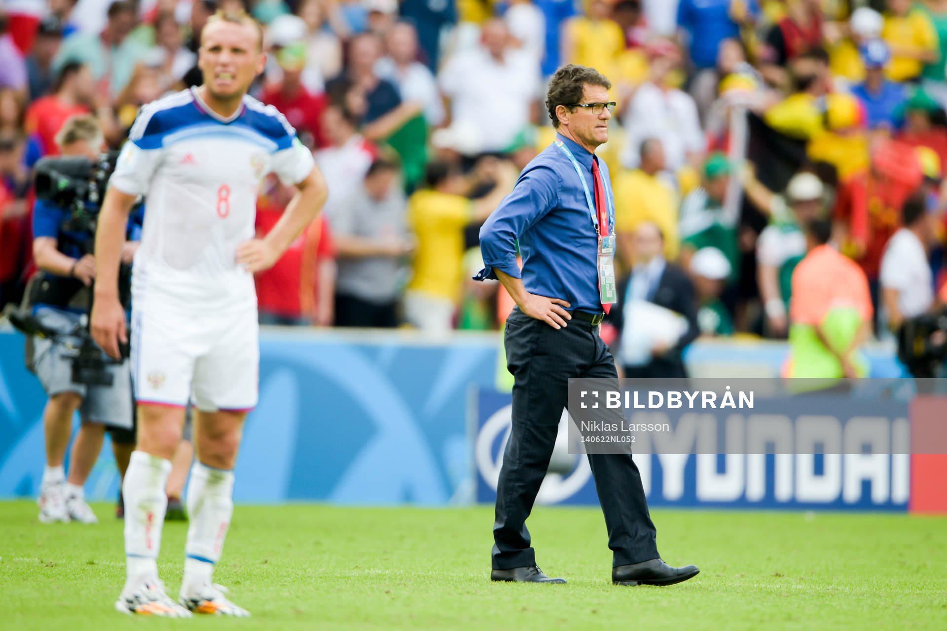 Rysslands förbundskapten Fabio Capello och Denis Glushakov
