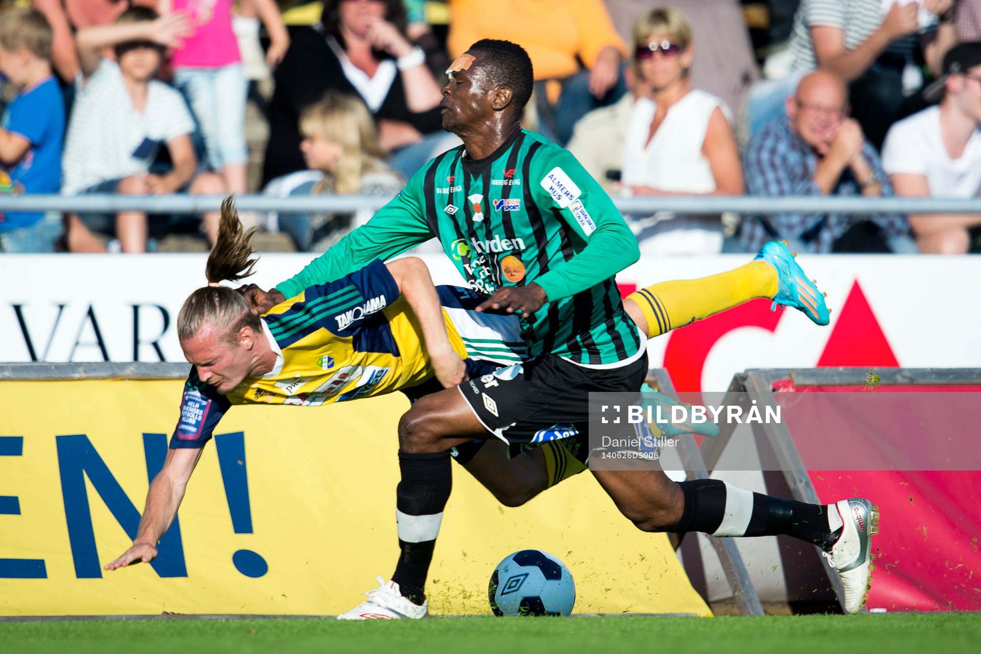 Varbergs Ibrahim Koroma trycker ner Ljungskiles Jonas Lindberg under fotbollsmatchen i Superettan mellan Varberg och Ljungskile den 26 juni 2014 i Varberg.