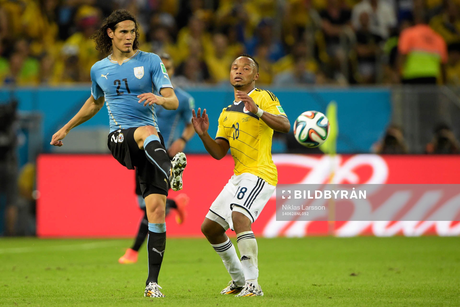 Uruguays Edinson Cavani och Colombias Juan Zuniga