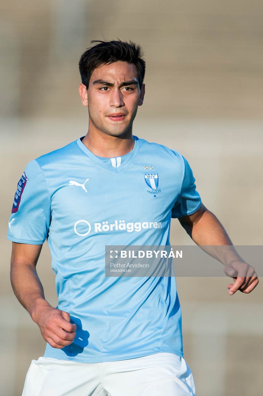 Malmö FFs Amin Nazari under fotbollsmatchen i Folksam U21 Allsvenskan Södra mellan Malmö FF och IFK Göteborg den 30 juni 2014 i Malmö.