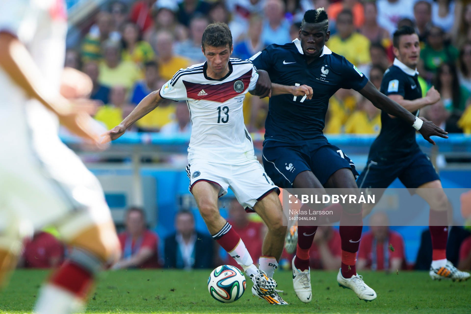 Tysklands Thomas Müller och Frankrikes Paul Pogba