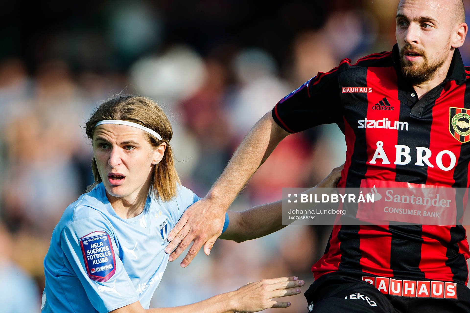 Malmö FFs Pawel Cibicki i kamp med Brommapojkarnas Kristinn Jónsson under fotbollsmatchen i Allsvenskan mellan Brommapojkarna och Malmö FF den 6 juli 2014 i Stockholm. 