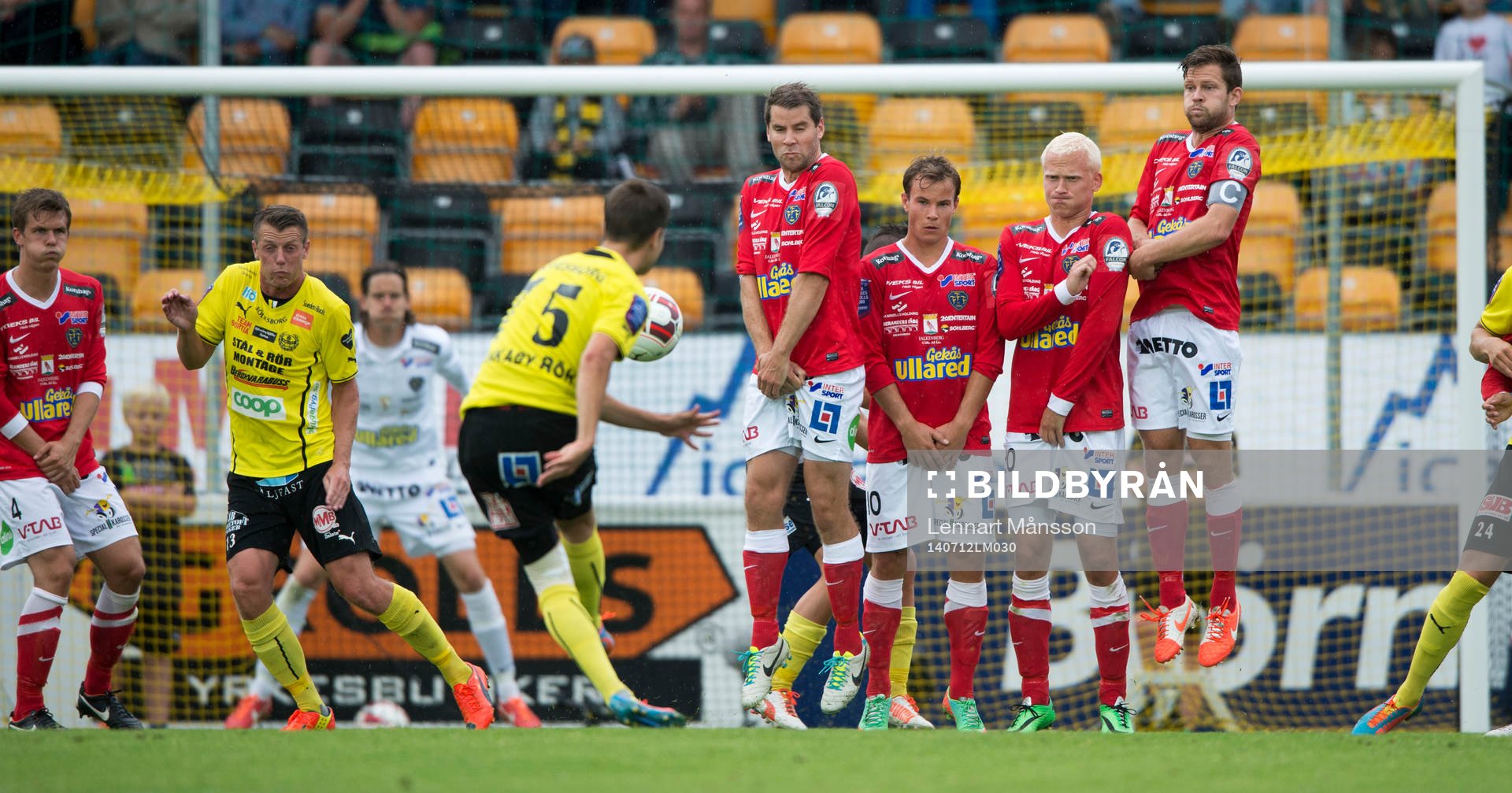 Mjällbys Andreas Blomqvist slår en frispark som Otto Martler tvingas rädda i den allsvenska fotbollsmatchen mellan Mjällby och Falkenberg i Mjällby 12 juli.