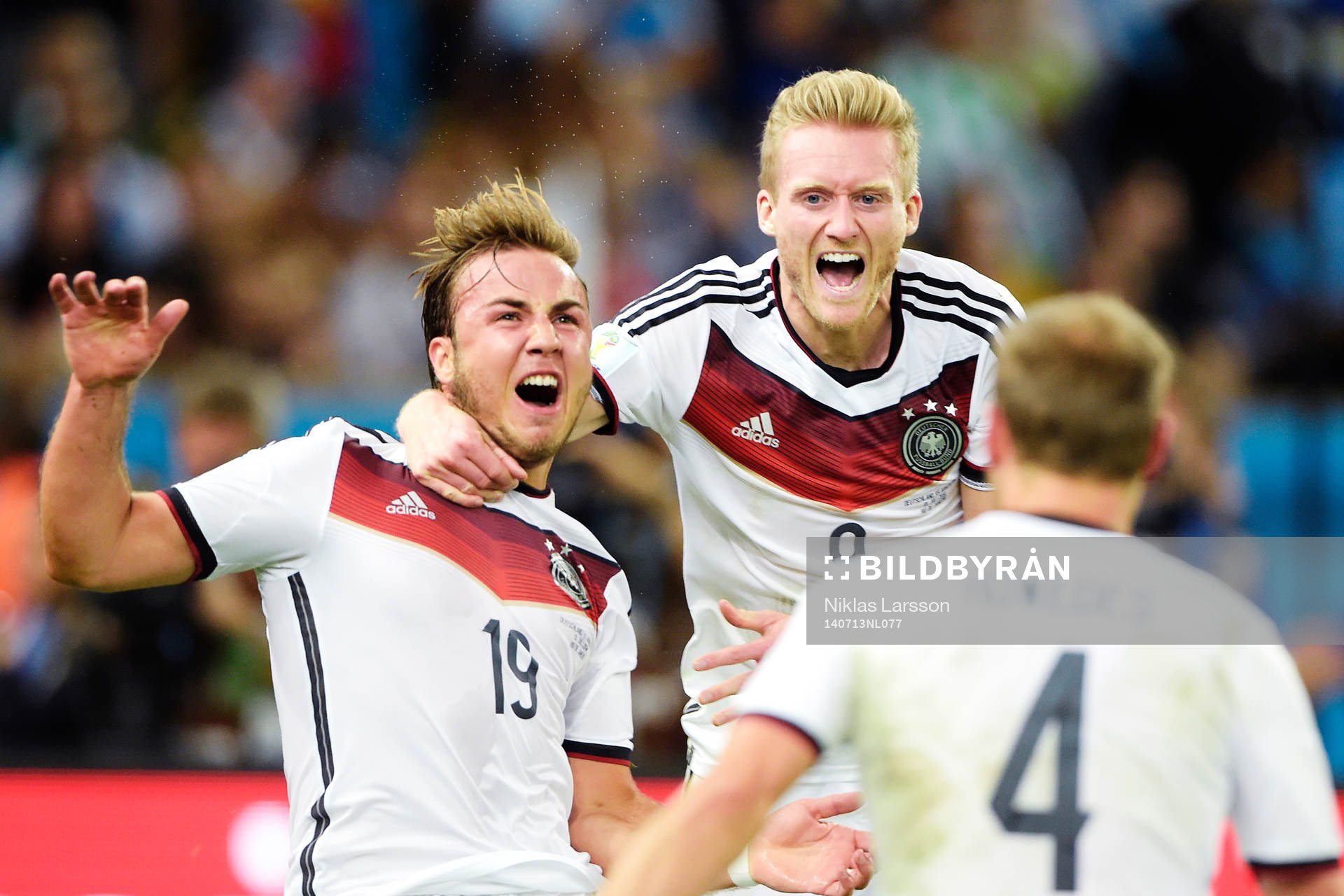 Tysklands Mario Götze och Andre Schuerrle jublar