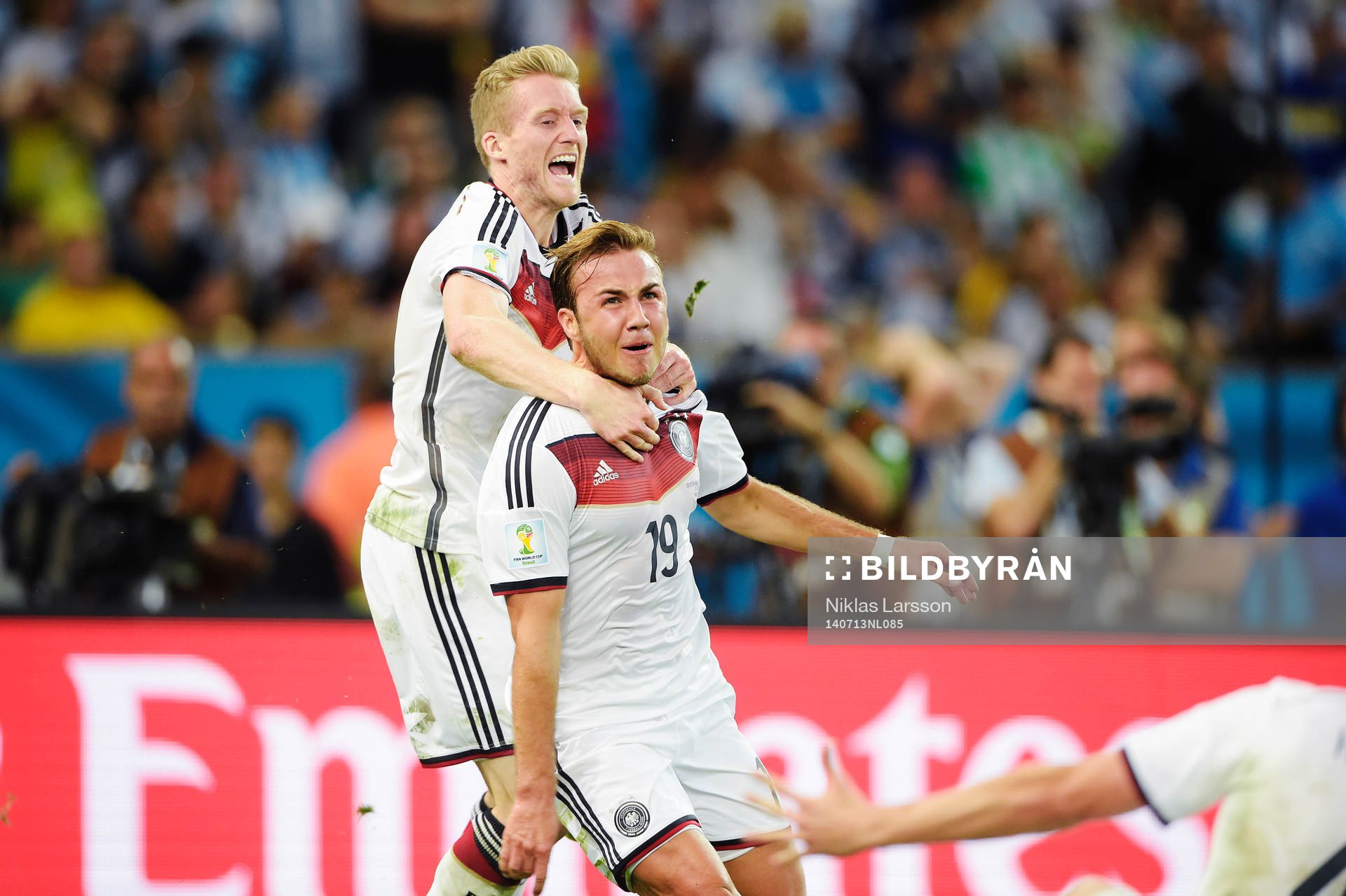 Tysklands Mario Götze och Andre Schuerrle jublar
