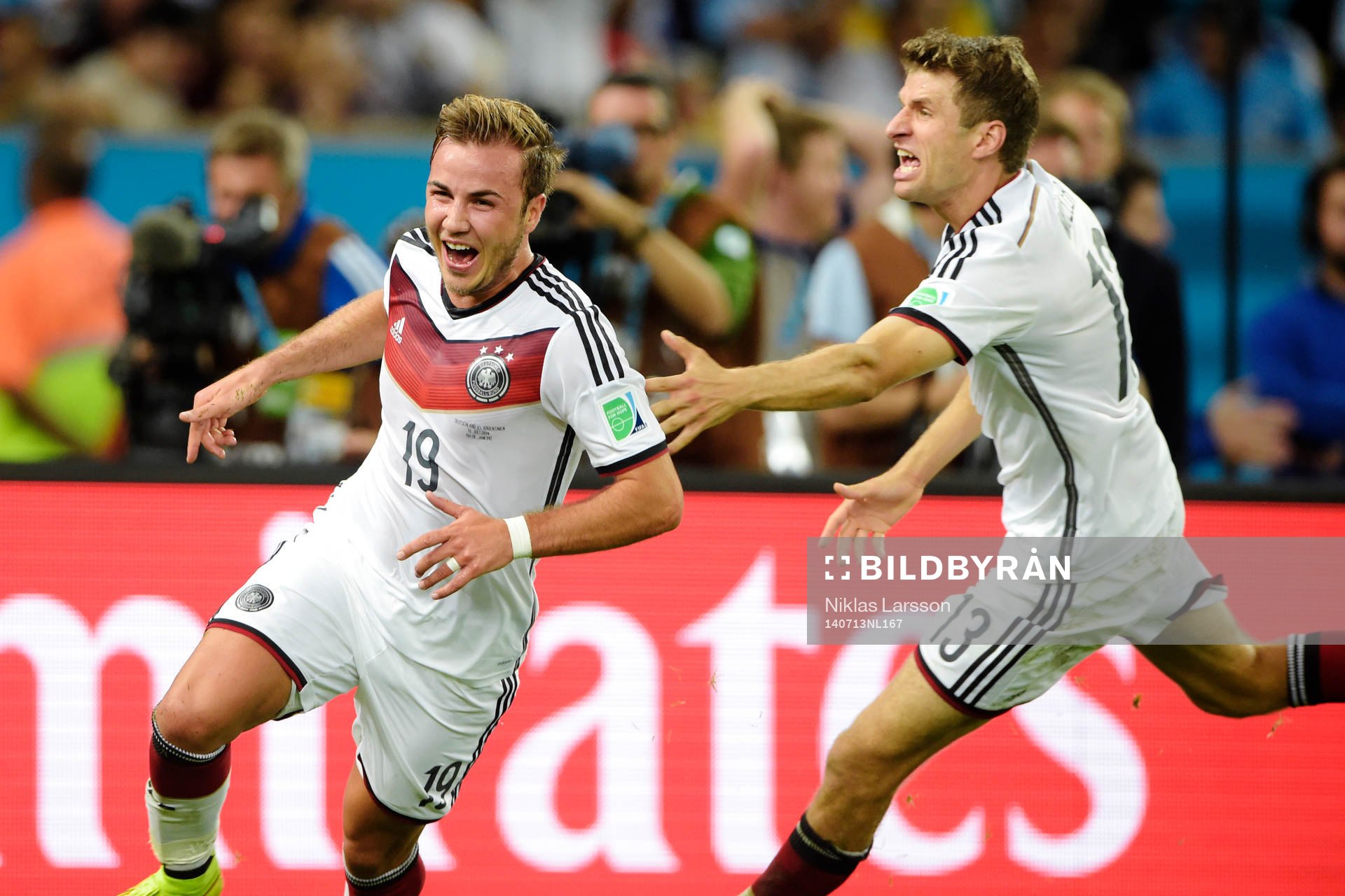 Tysklands Mario Götze och Thomas Müller jublar